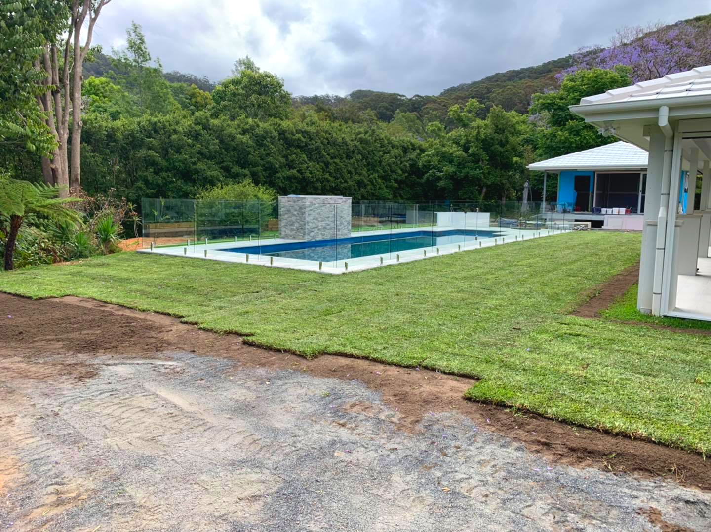 Turf Installation Beside Pool Area — All Round Ground Maintenance in Woolgoolga, NSW