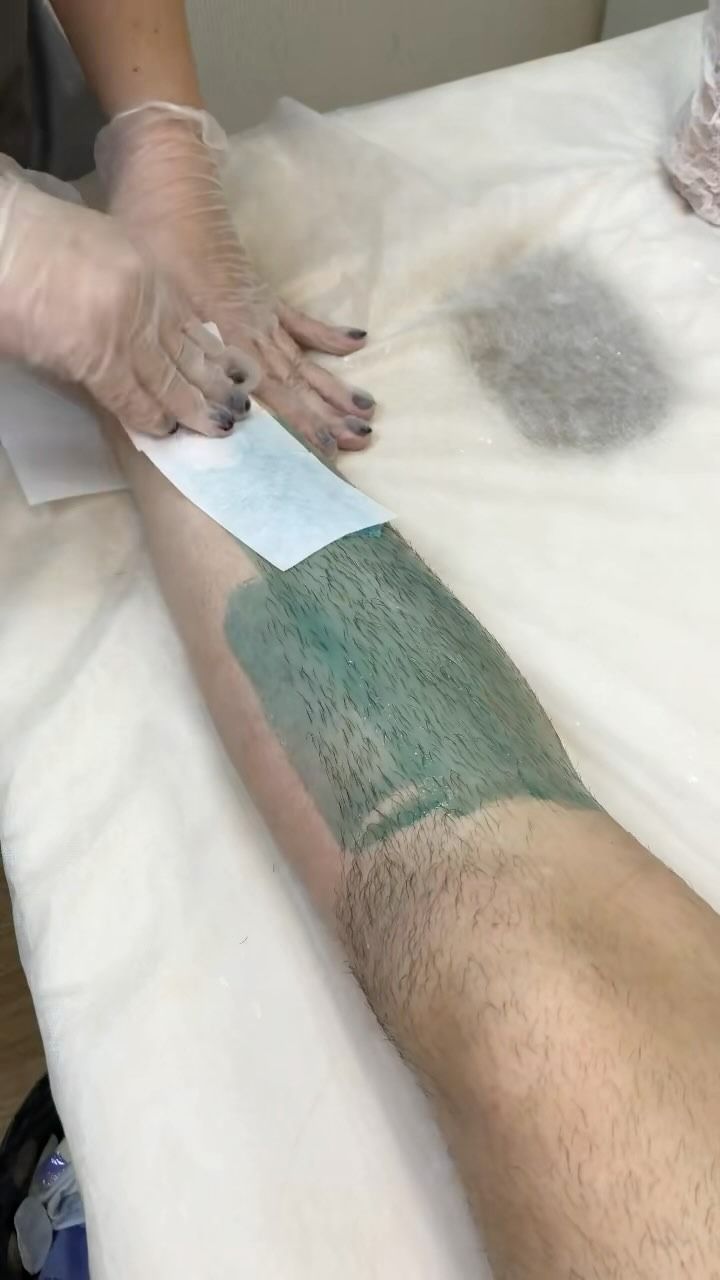 A Person's Leg Being Waxed — Sage Spa & Beauty in Mackay, QLD
