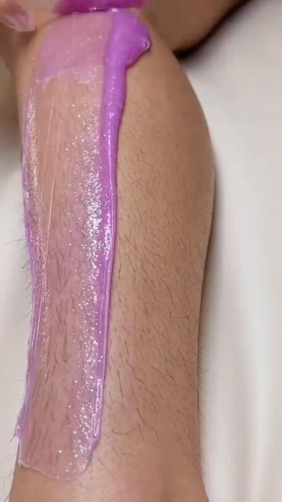 Leg Being Waxed With Purple Wax — Sage Spa & Beauty in Mackay, QLD