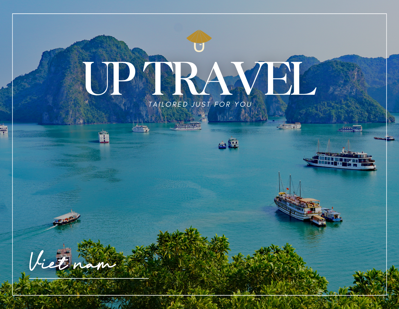 A scenic view of Ha Long Bay, Vietnam, with emerald waters, limestone islands, and traditional boats framed by lush green foliage.