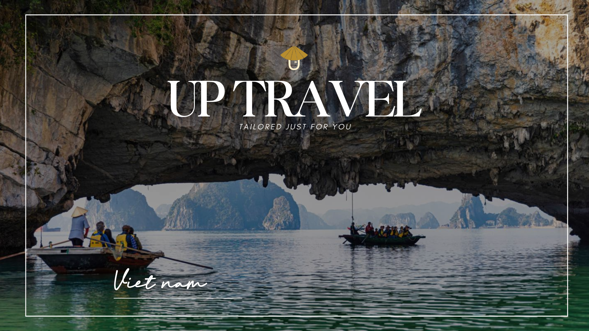 Visitors paddling through a limestone arch cave on a bamboo boat in Ha Long Bay.