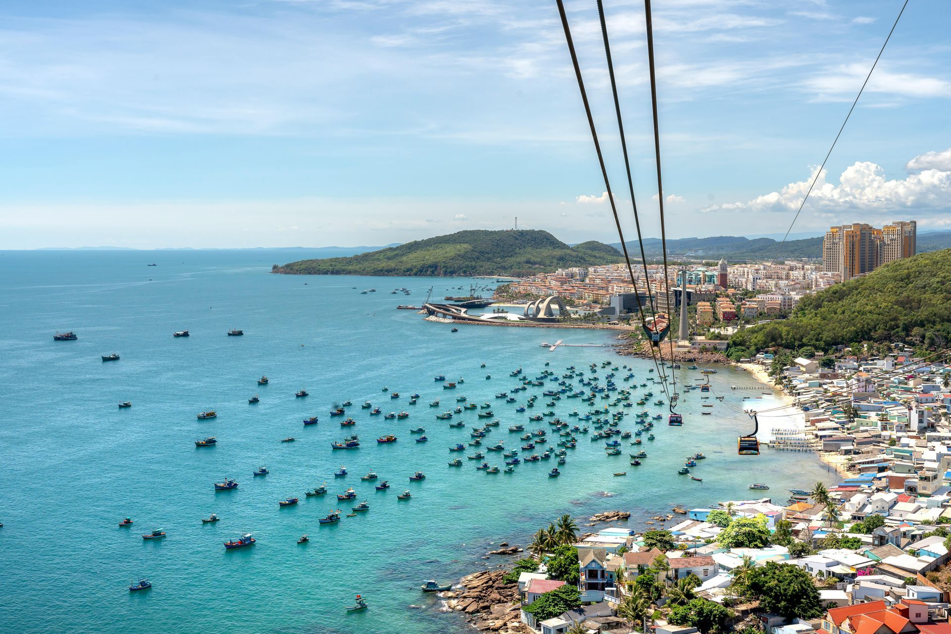 Aerial view of Phu Quoc Island, showcasing its pristine beaches and lush green landscape.