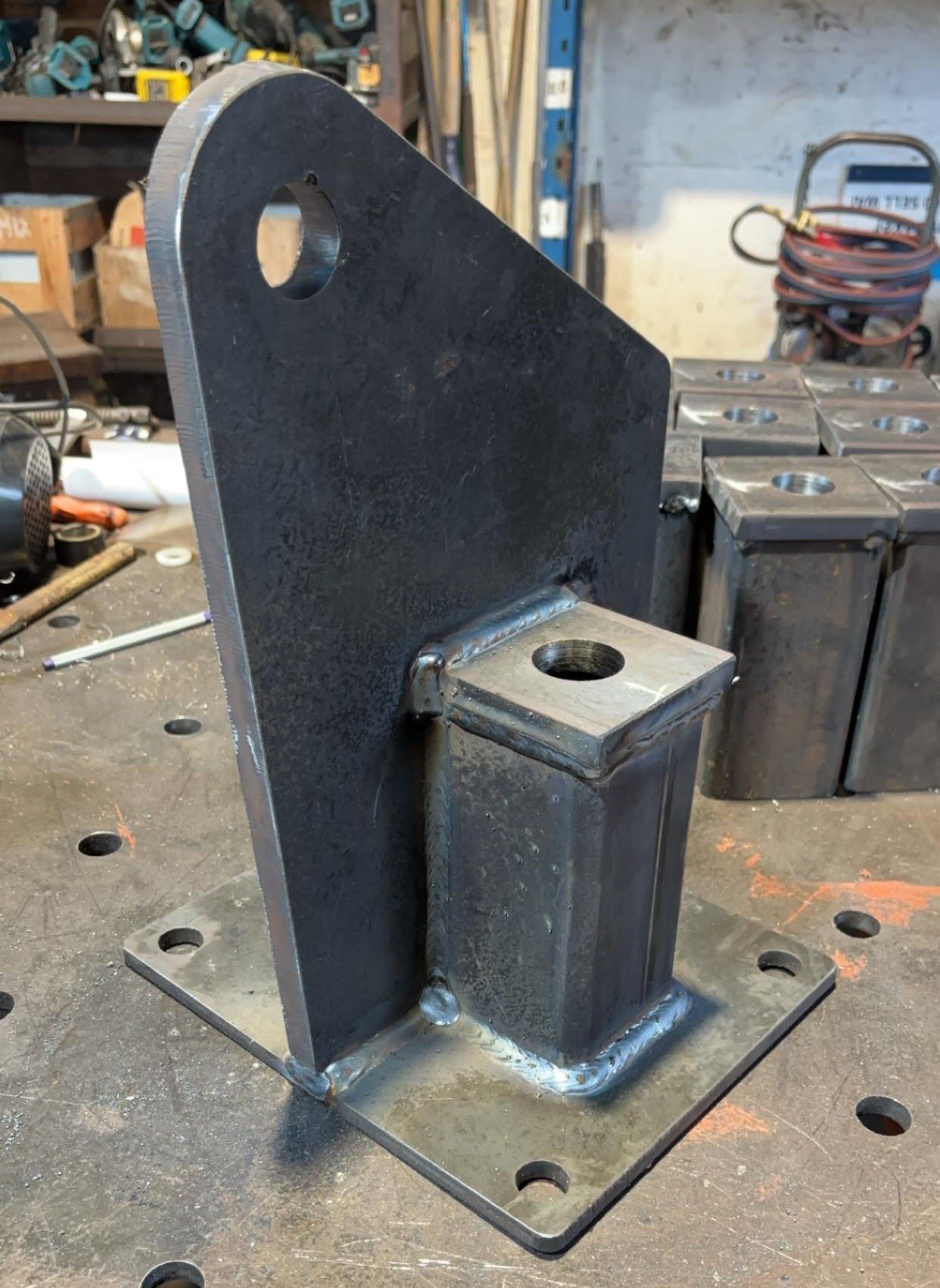 A piece of metal is sitting on top of a table.