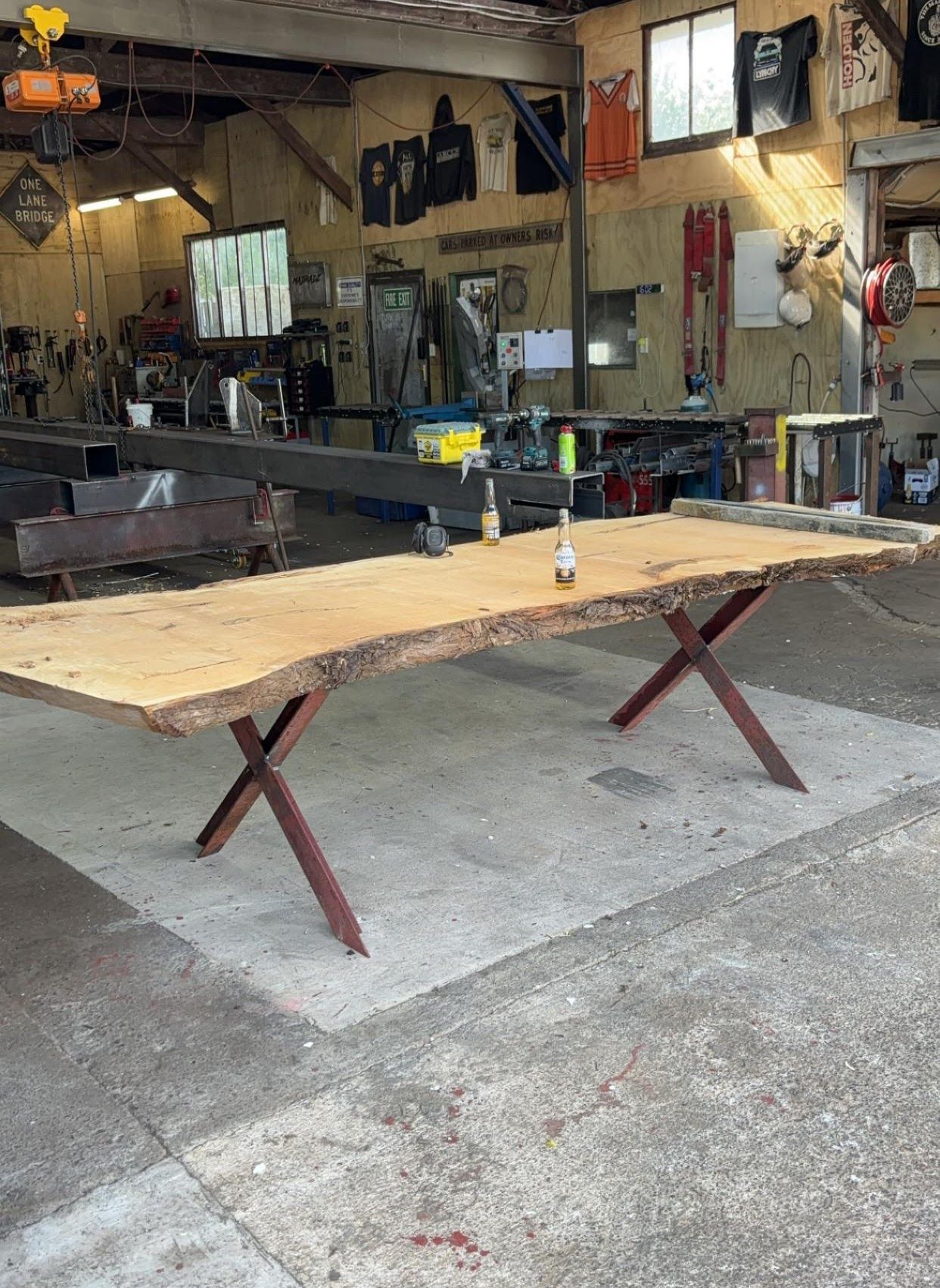 A wooden table is sitting on the floor in a room.
