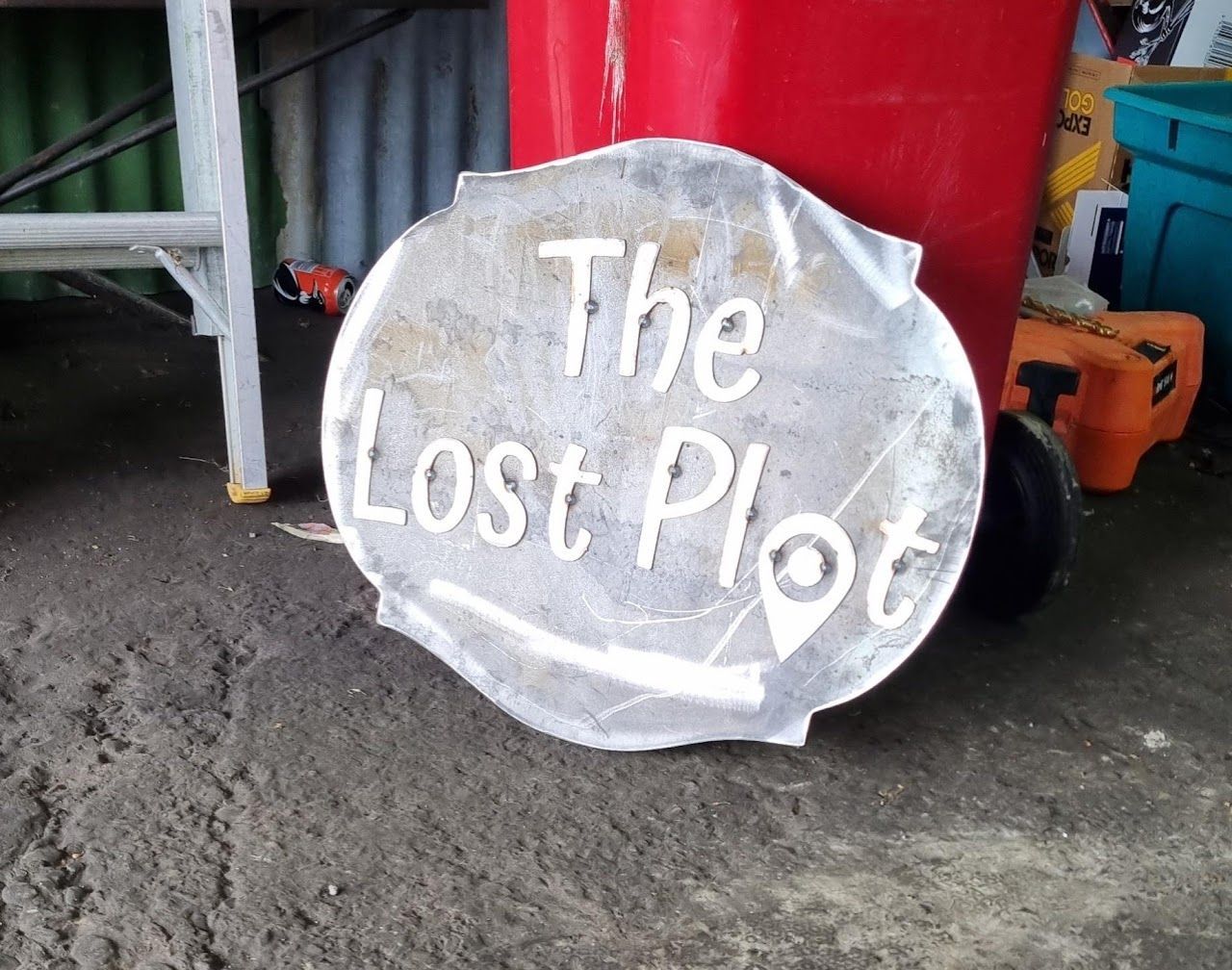 A sign that says the lost plot on it.