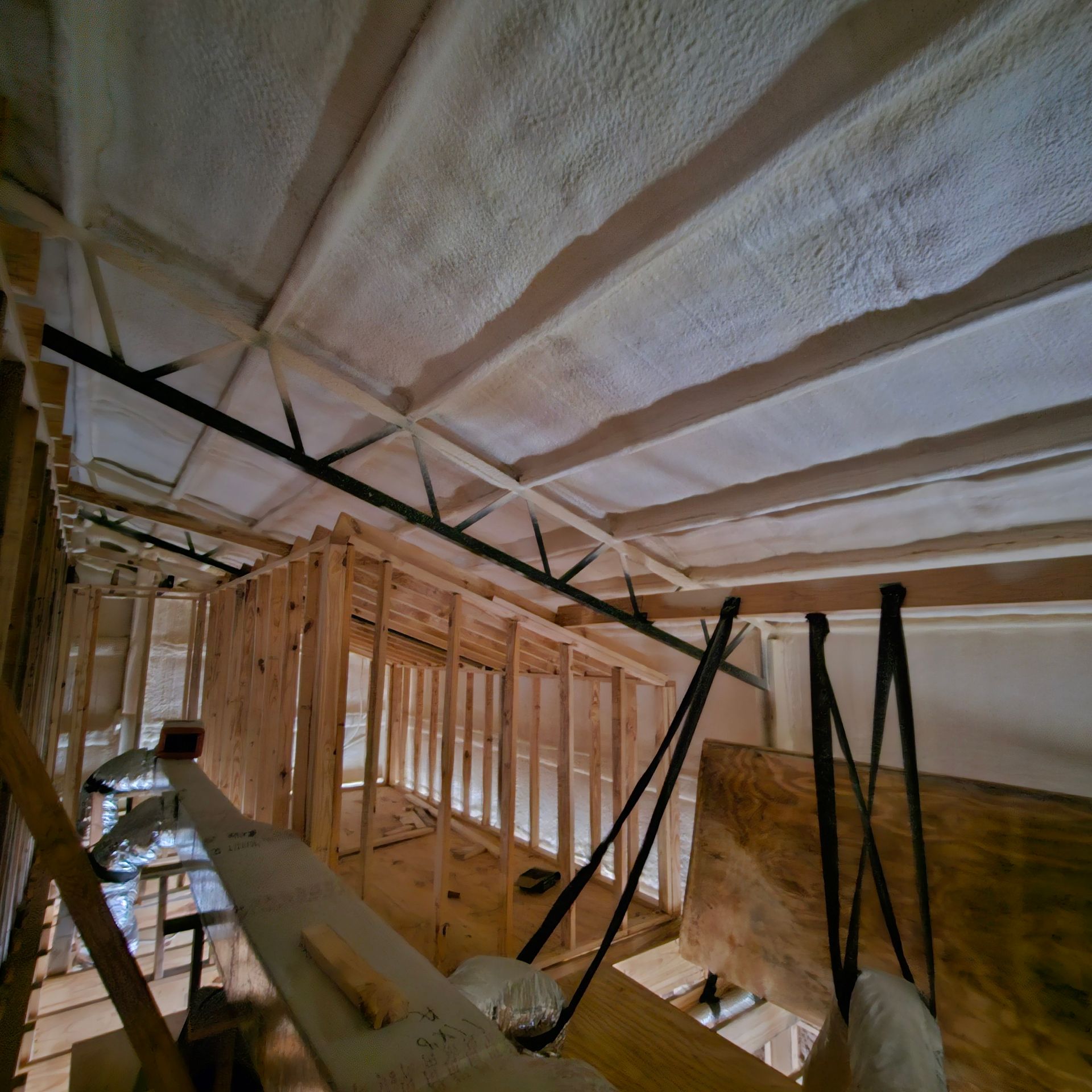 An empty room with a window and a box that says n on it