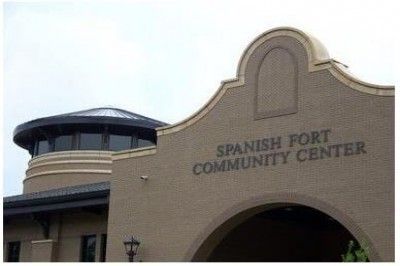 The spanish fort community center is a large building with a dome on top of it.