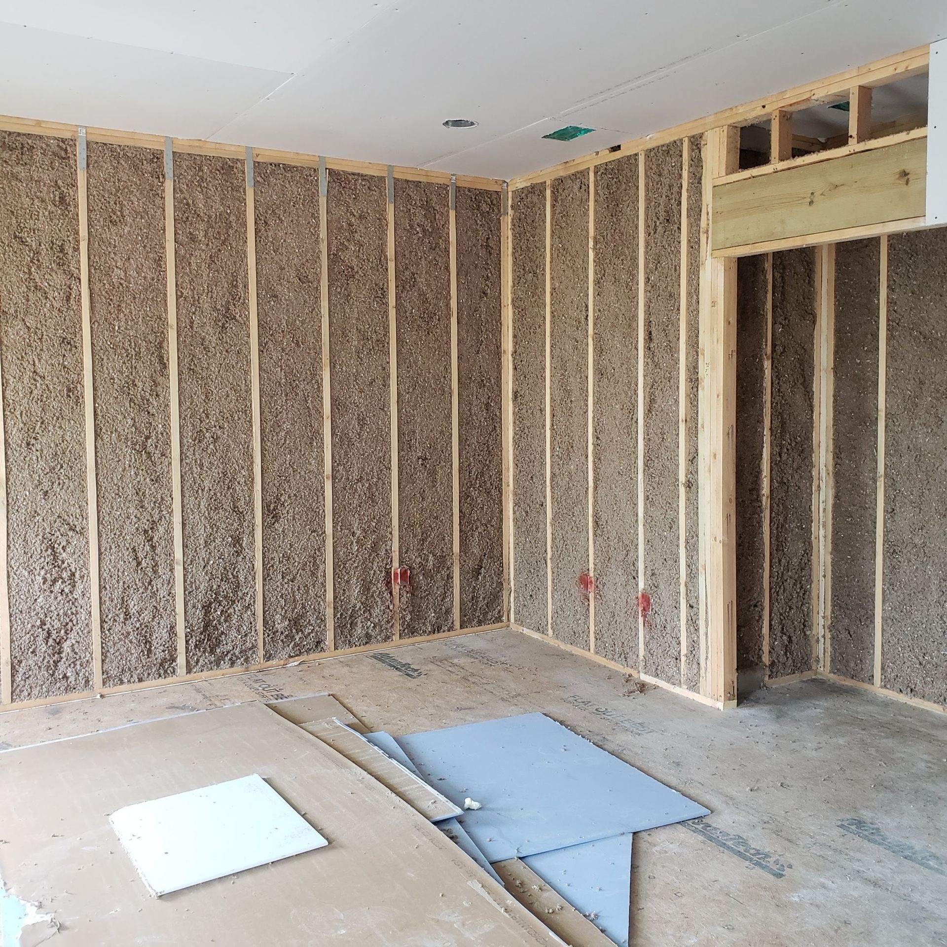 A room that is being built with wooden walls
