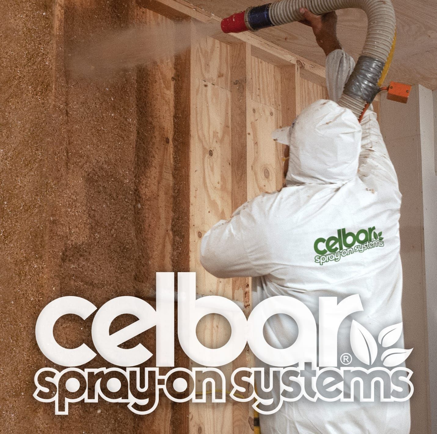 A man spraying a wall with celbar cellulose spray in systems