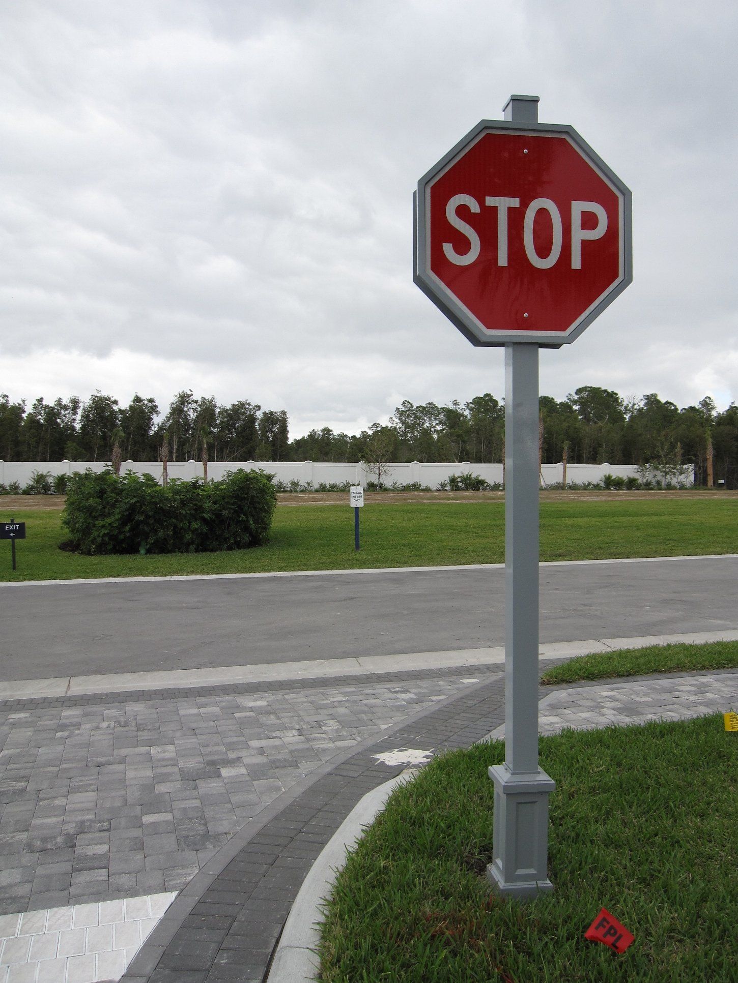 A stop sign is on the side of the road