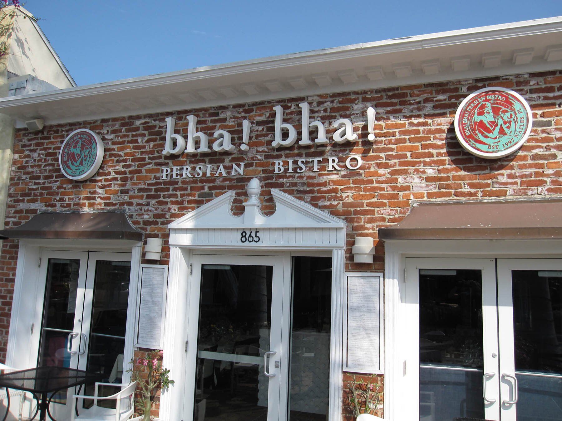 A brick building with the word bistro on it