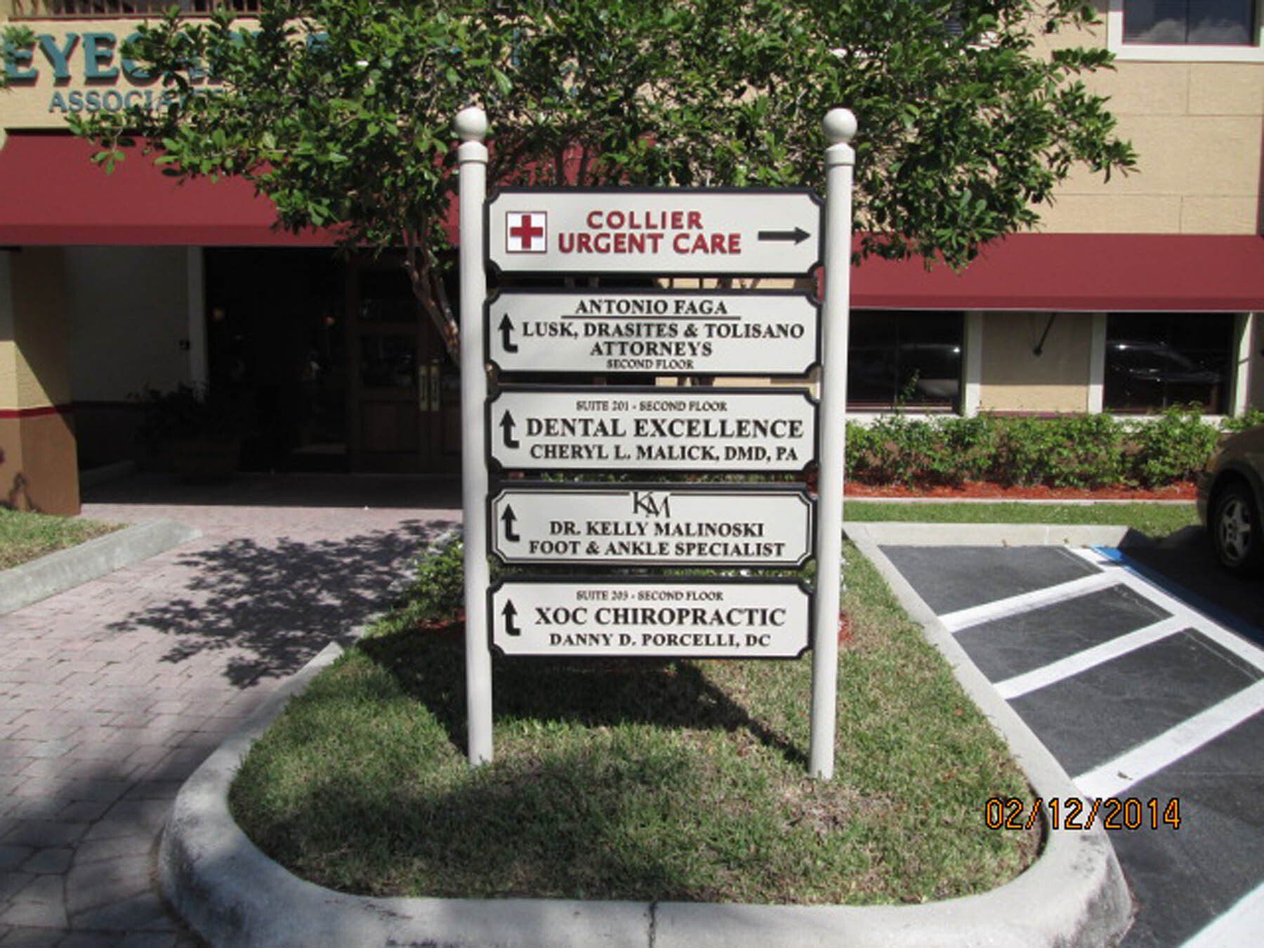 A sign that says collier urgent care on it