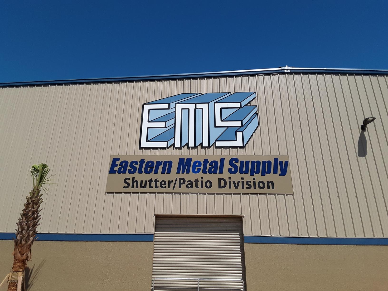A building with a sign that says eastern metal supply