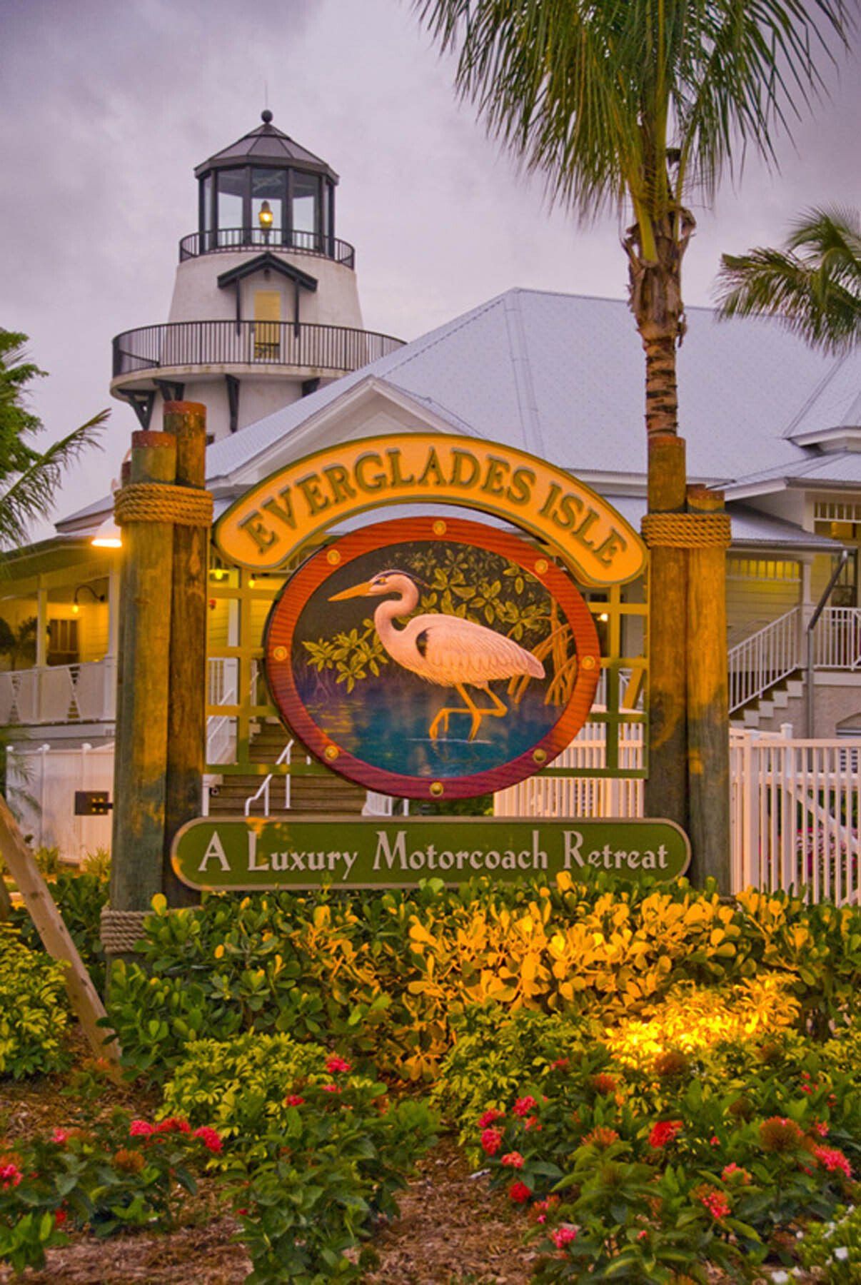 A sign for everglades isle a luxury motorcoach retreat