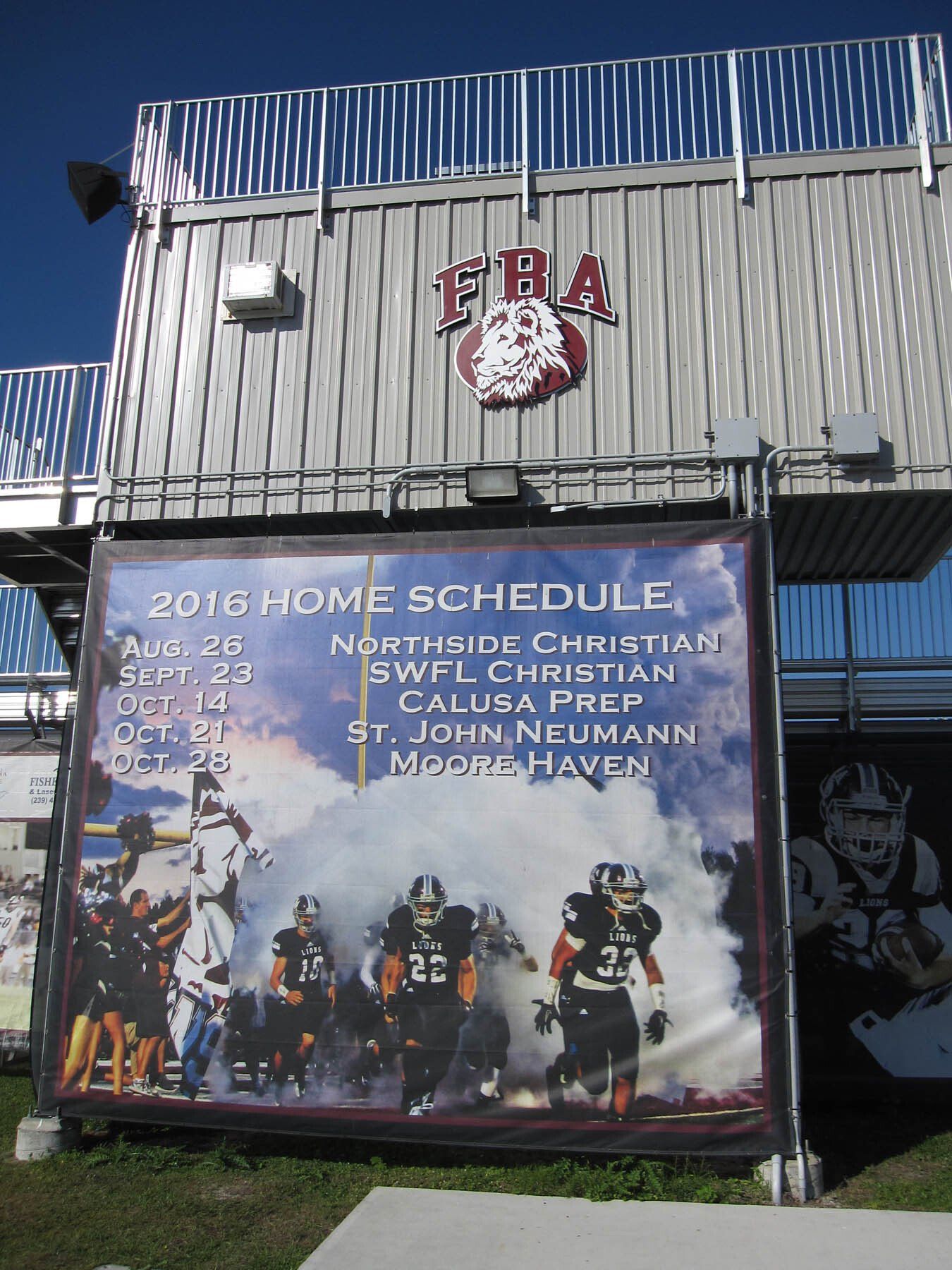 A sign for the fra football team shows their home schedule