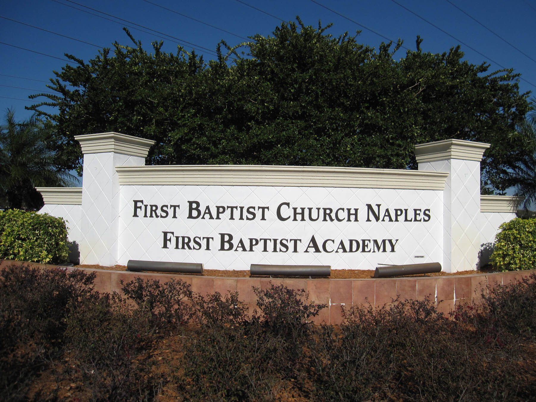 A sign for first baptist church naples first baptist academy