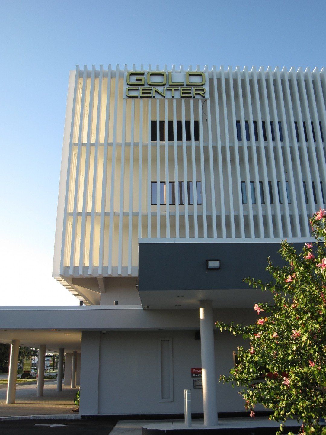 A building with a sign that says bold center