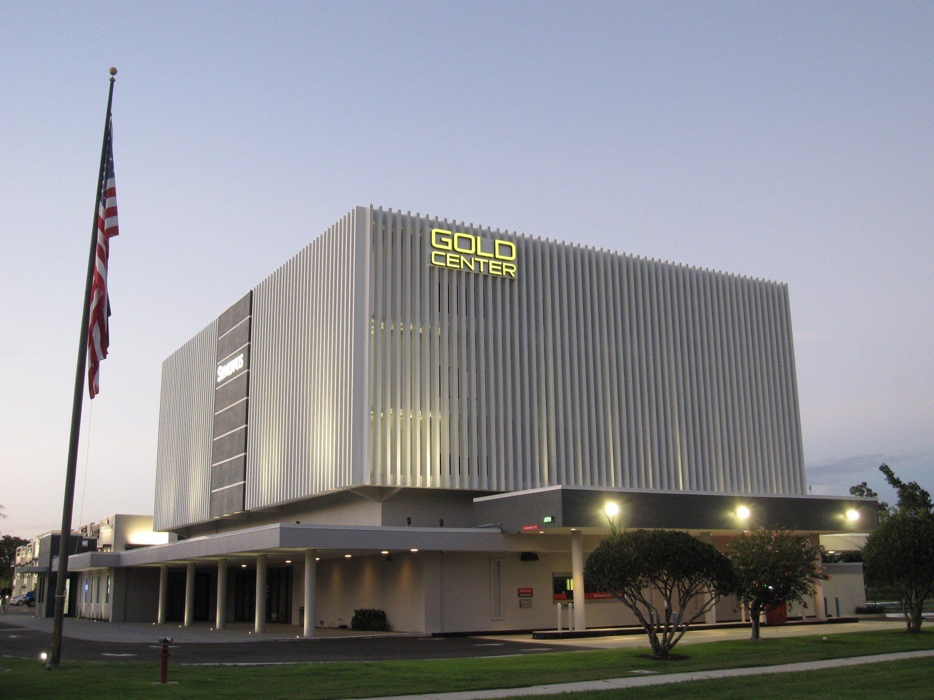 A large building with the word gold on it