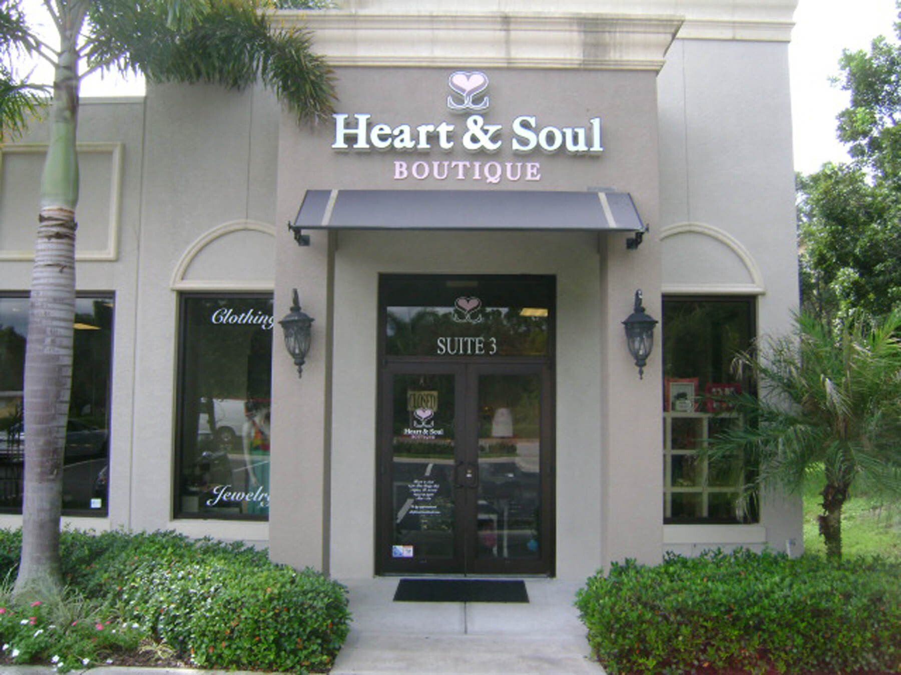 A building with a sign that says heart & soul boutique