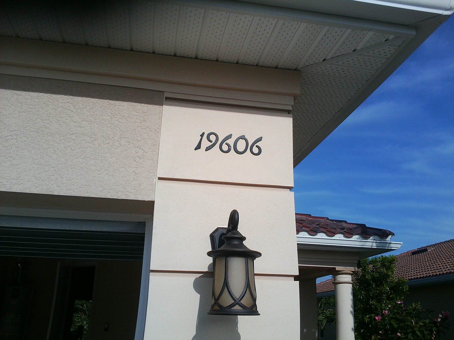 The number 19606 is on the side of a building
