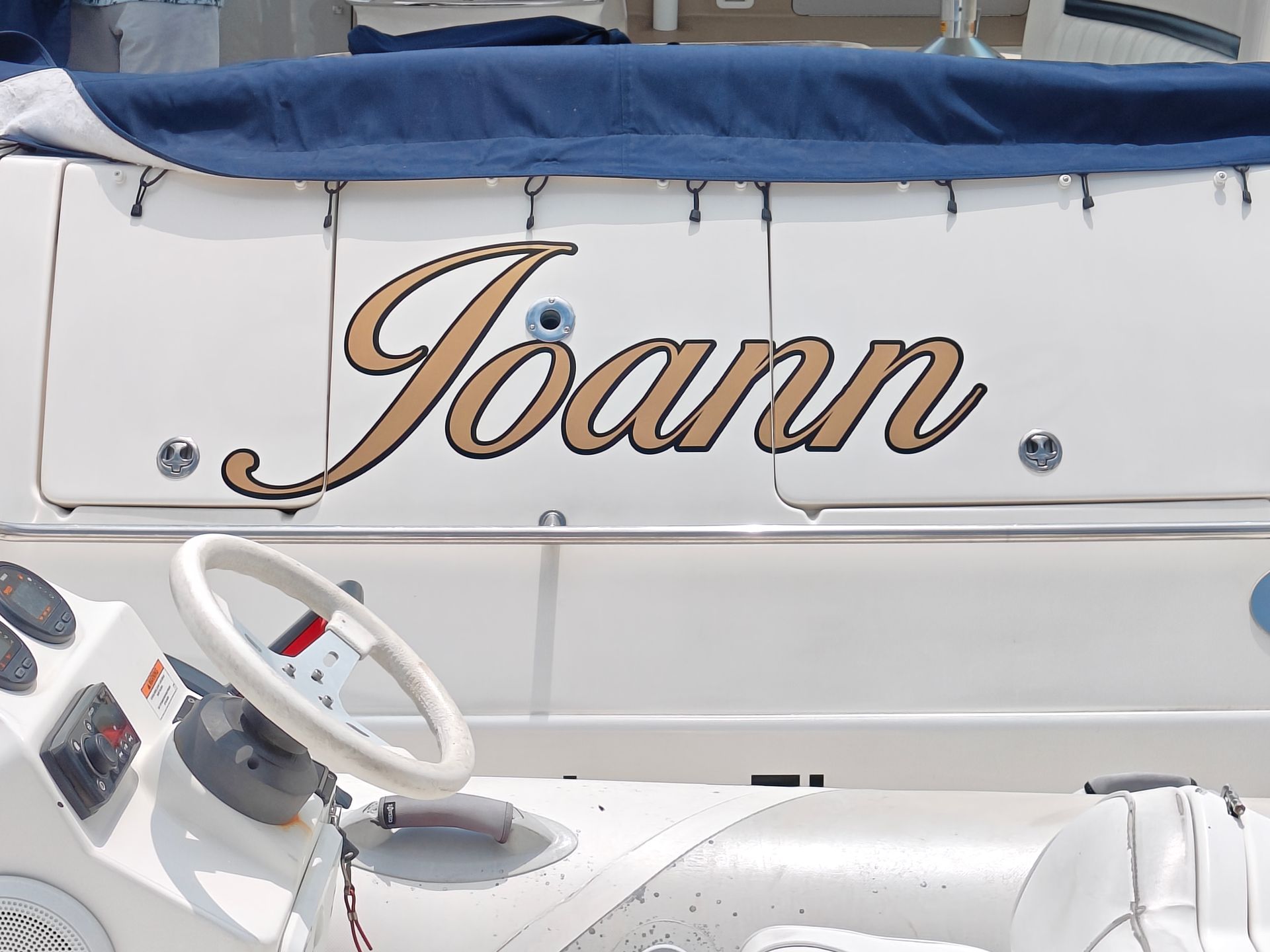 A boat with the name joann on it