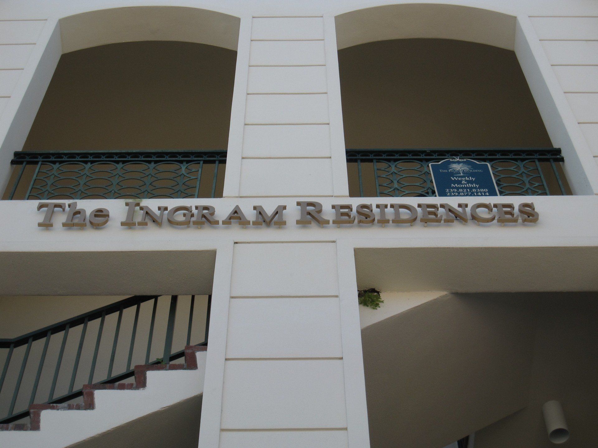 The ingram residences building with stairs leading up to it
