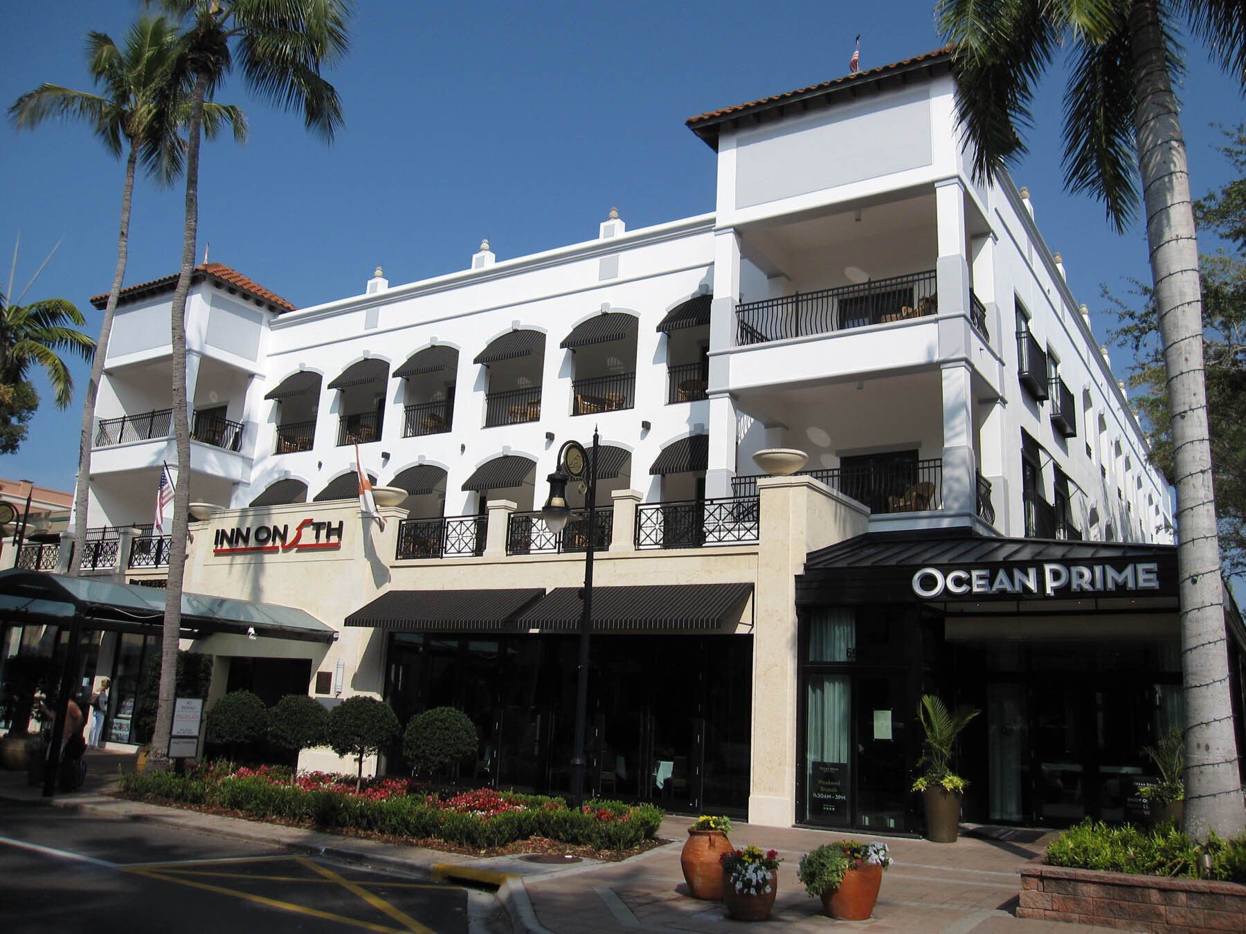 A large white building with a sign that says ocean prime