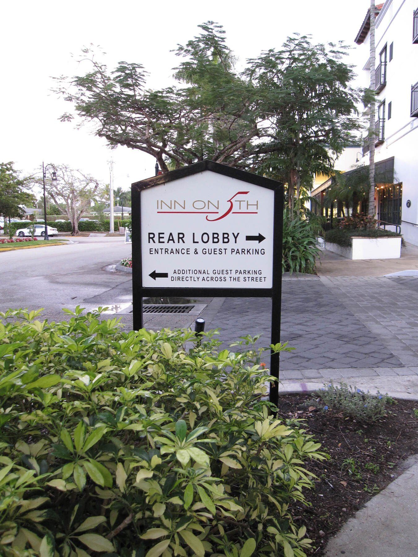 A sign for the inn on the rear lobby
