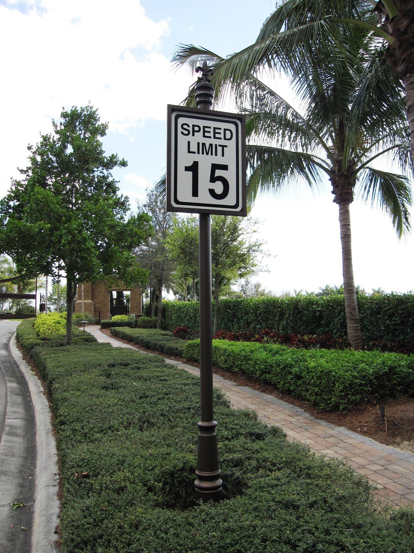 A speed limit sign with the number 15 on it