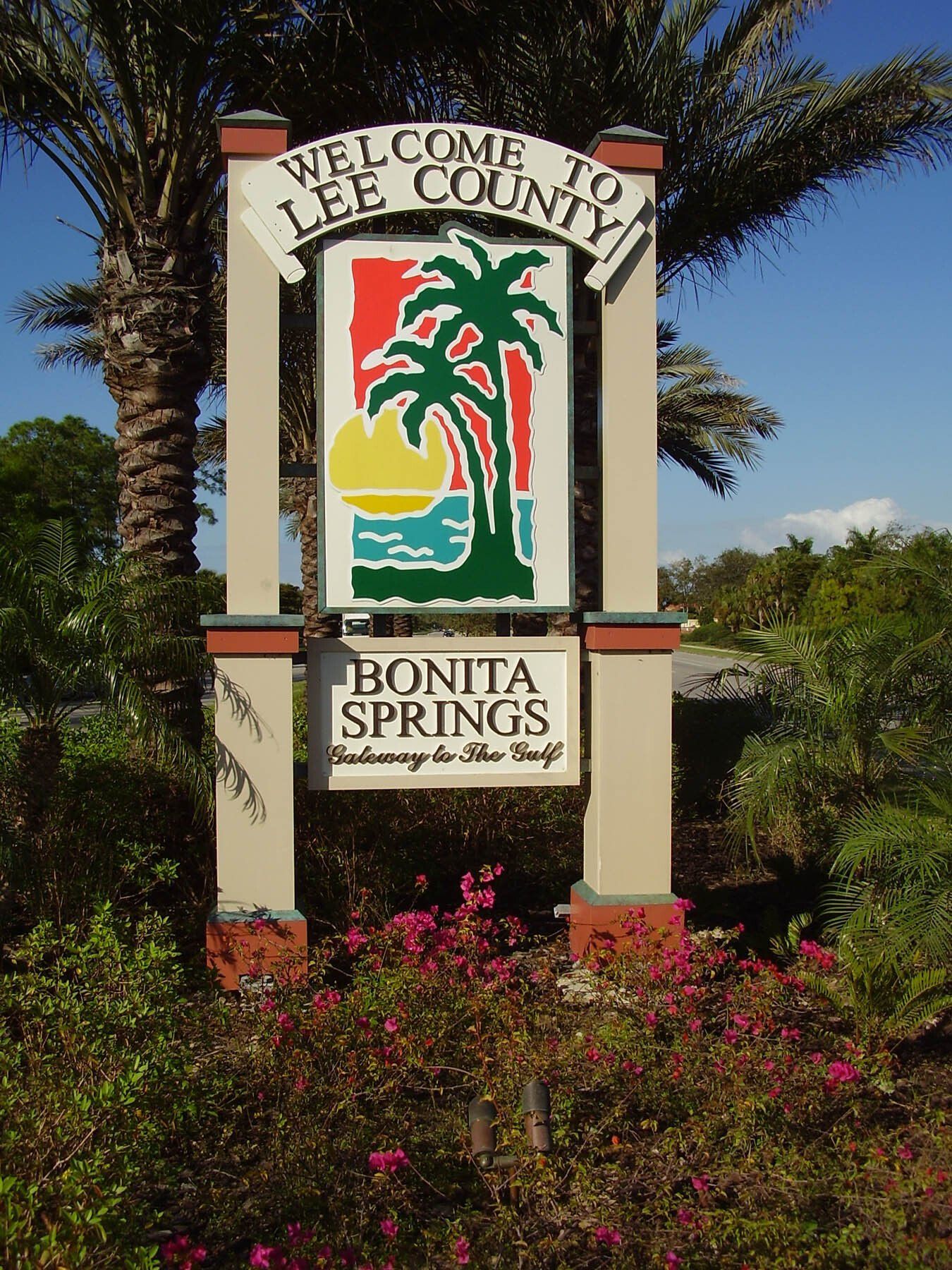 A sign that says welcome to lee county bonita springs