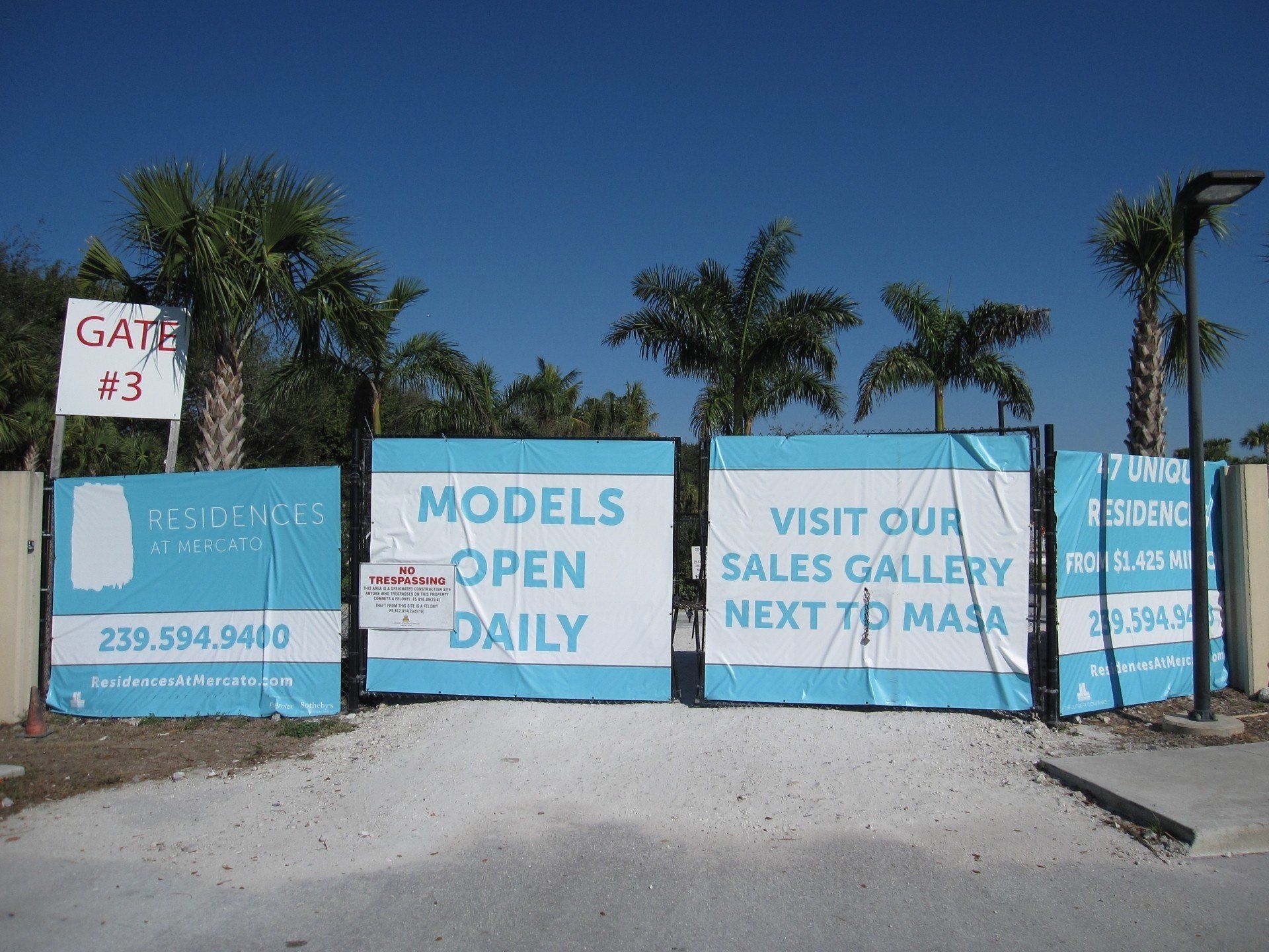 A blue and white sign that says models open daily