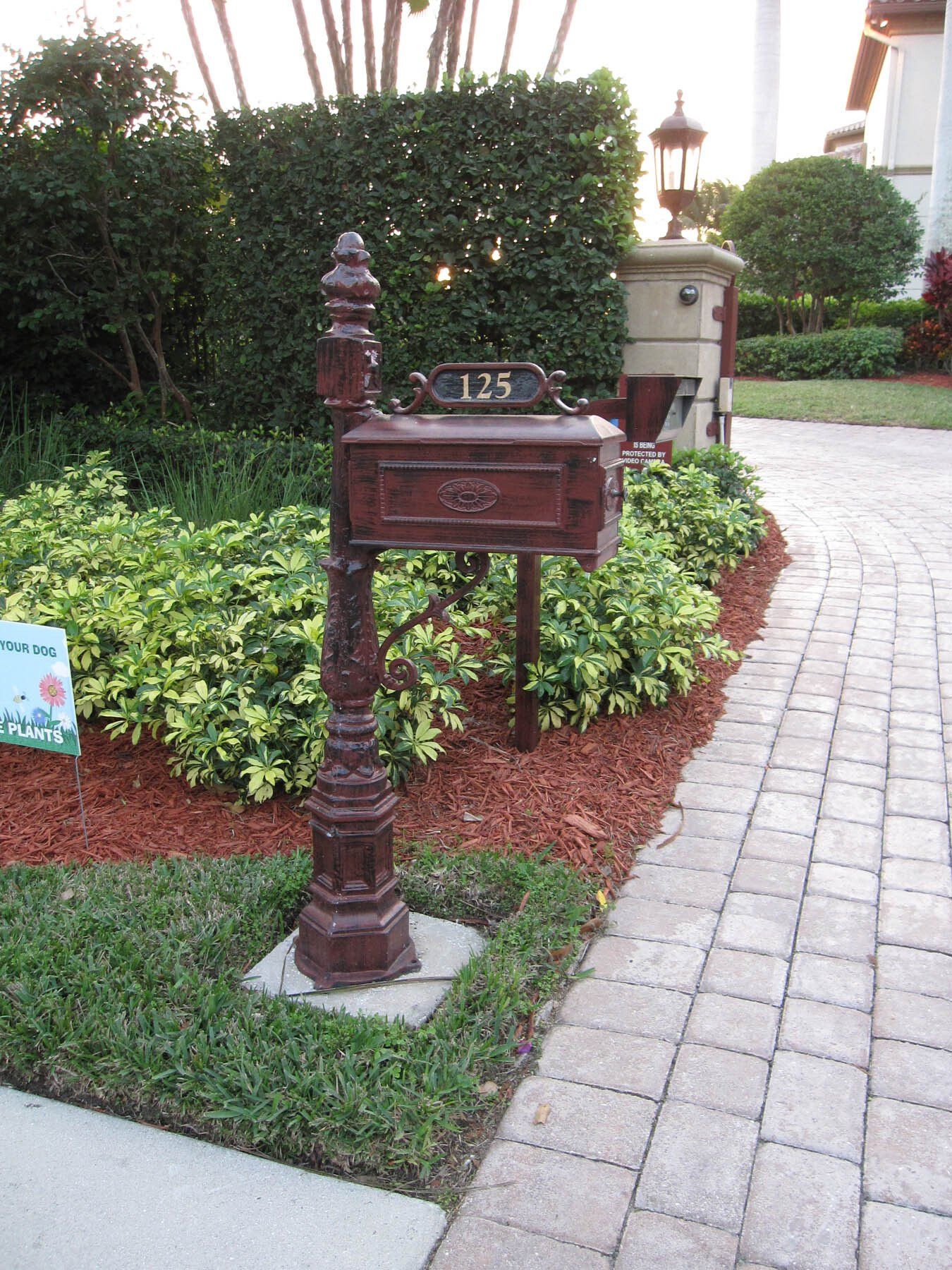 A mailbox with the number 25 on it