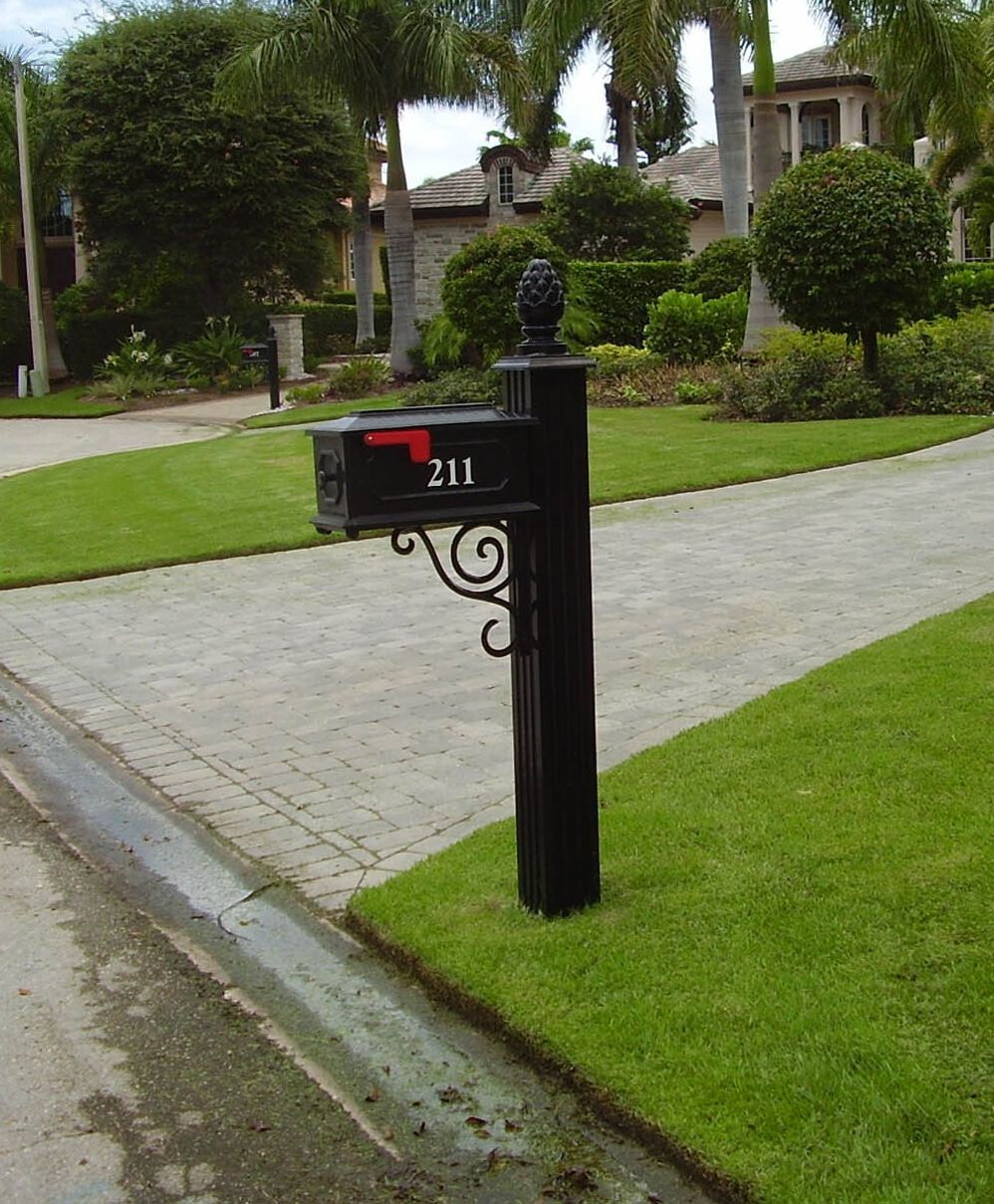 A black mailbox with the number 201 on it