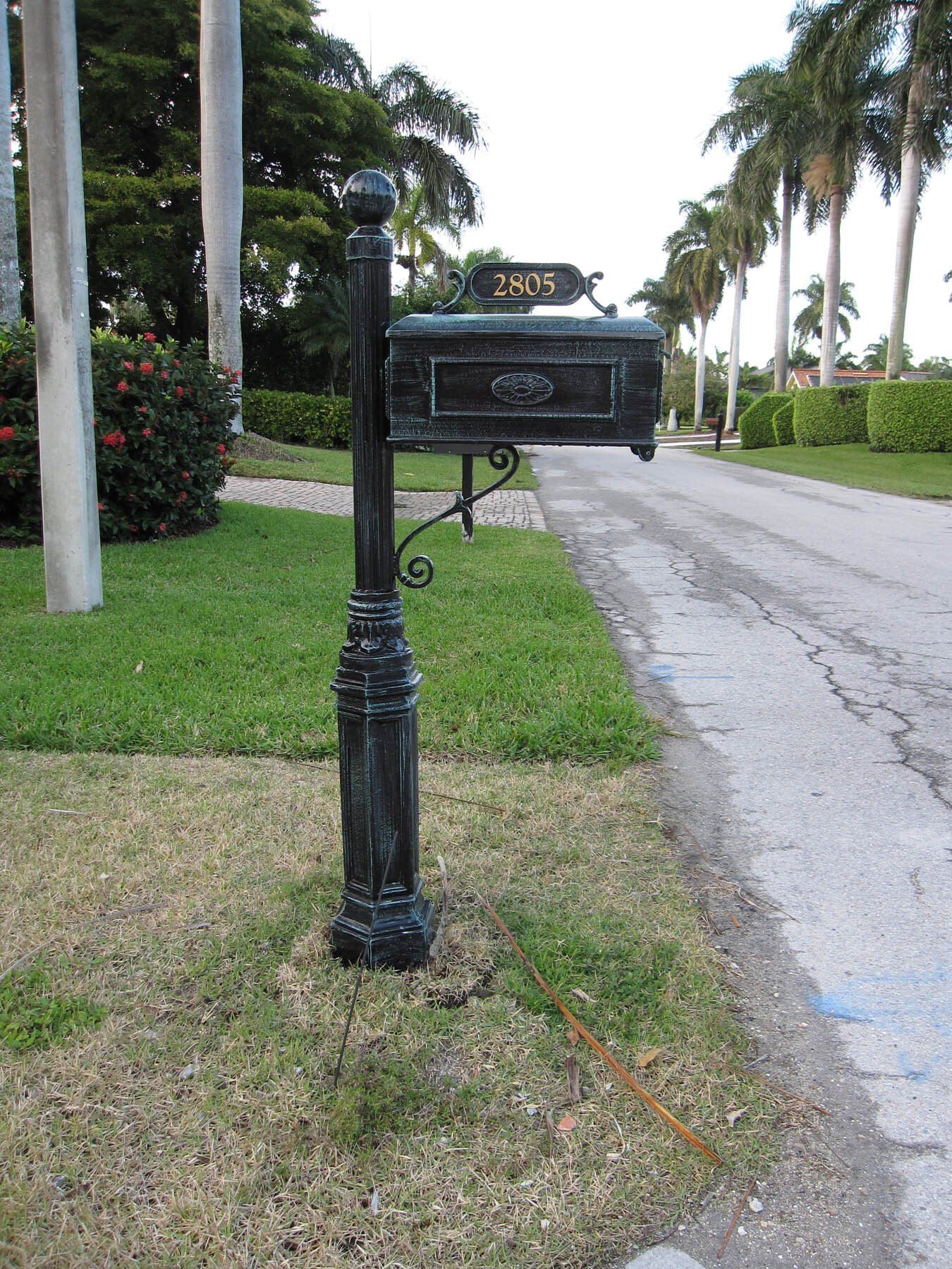 A black mailbox with the address 2505 on it