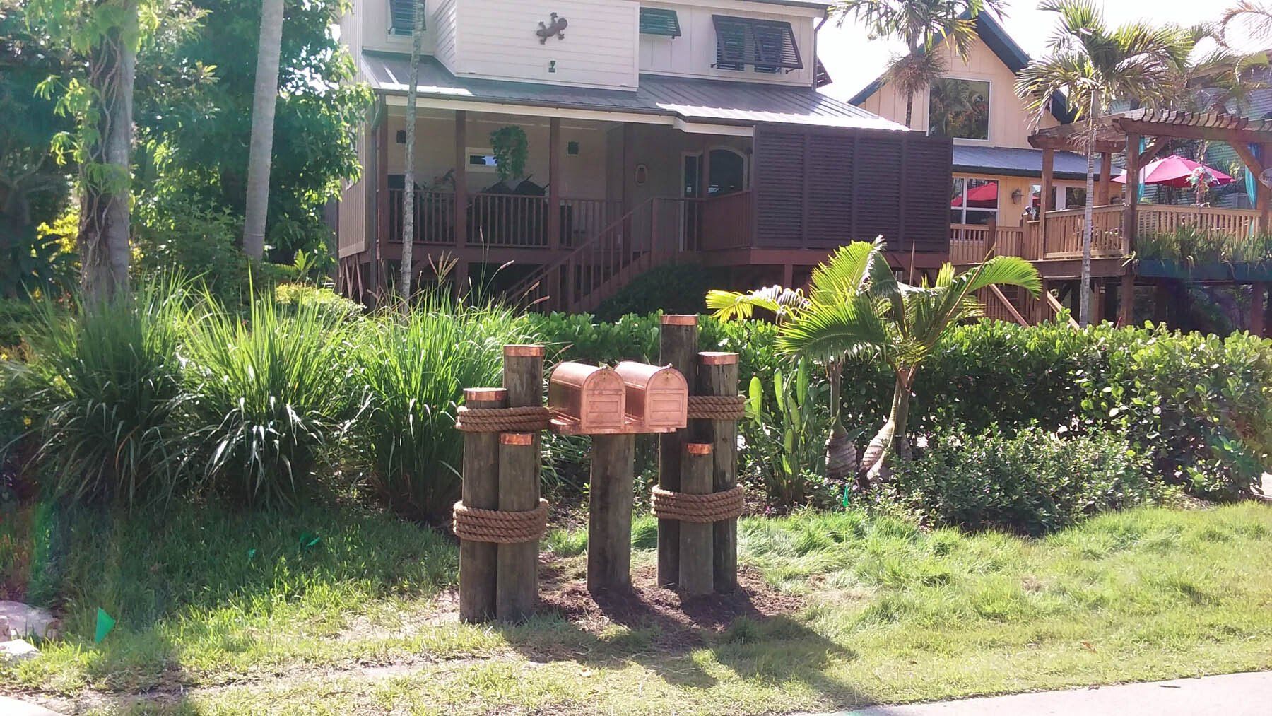 A house with a mailbox in front of it