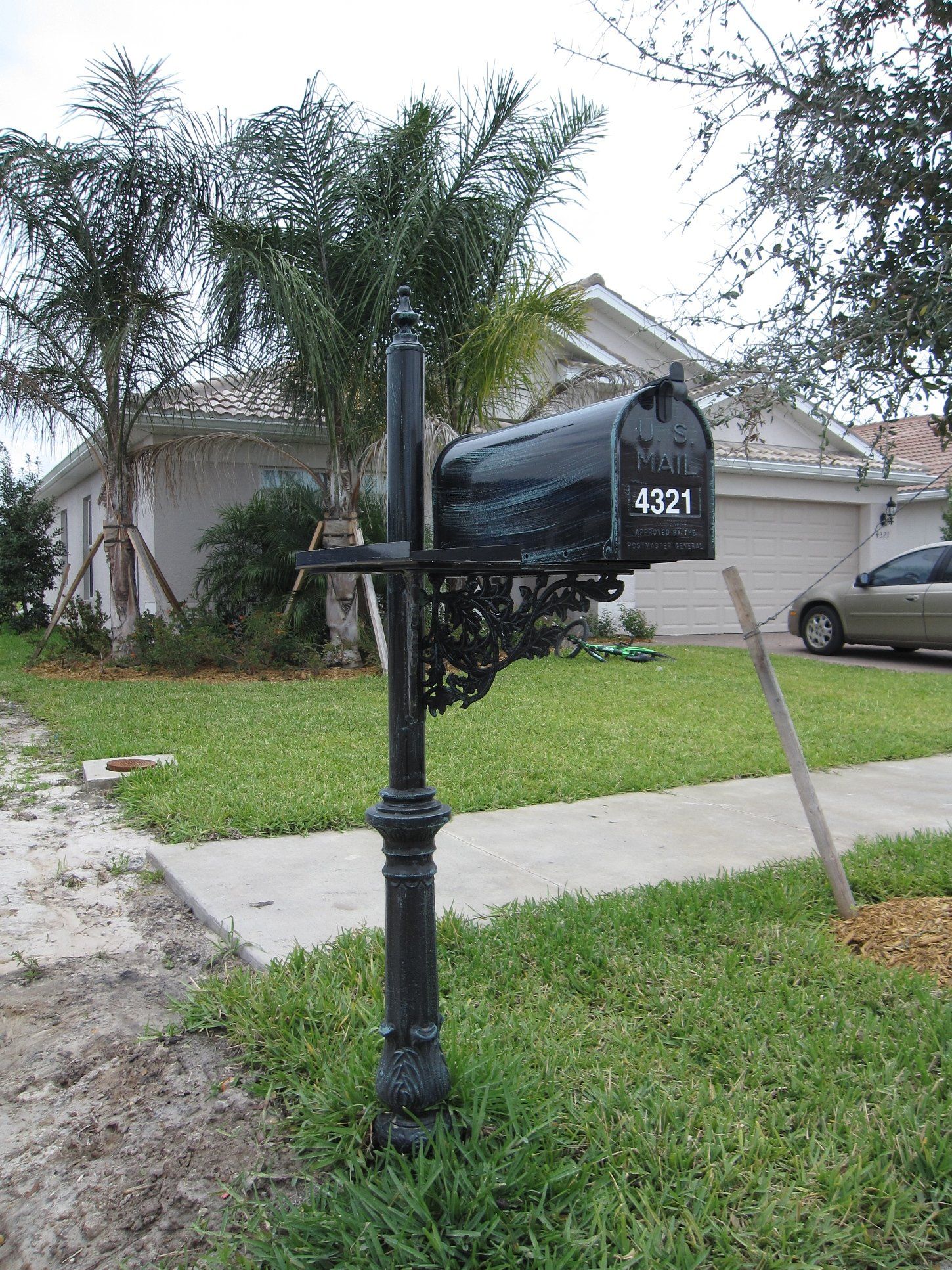 A black mailbox with the number 4022 on it