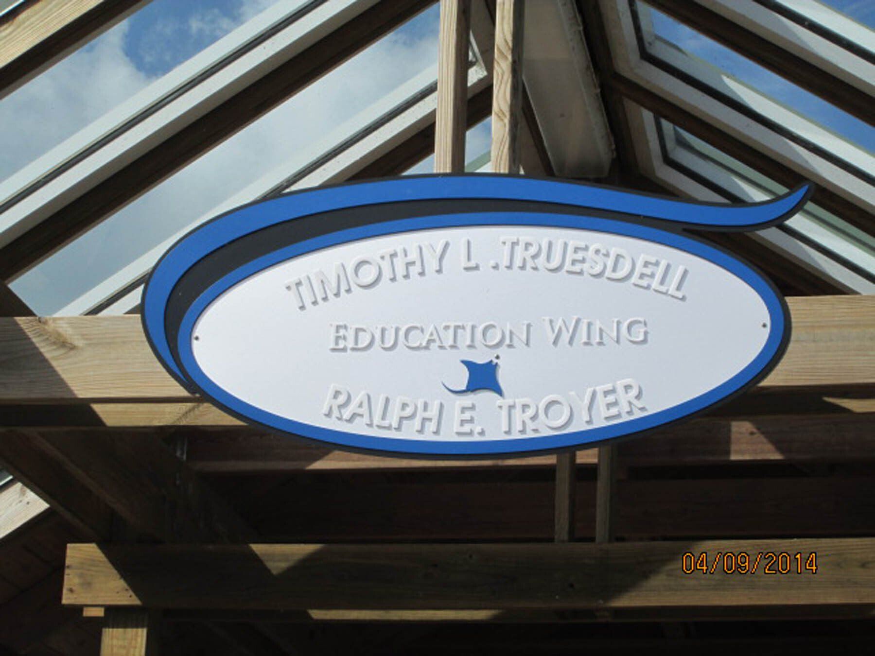 A sign that says timothy l truedell education willing