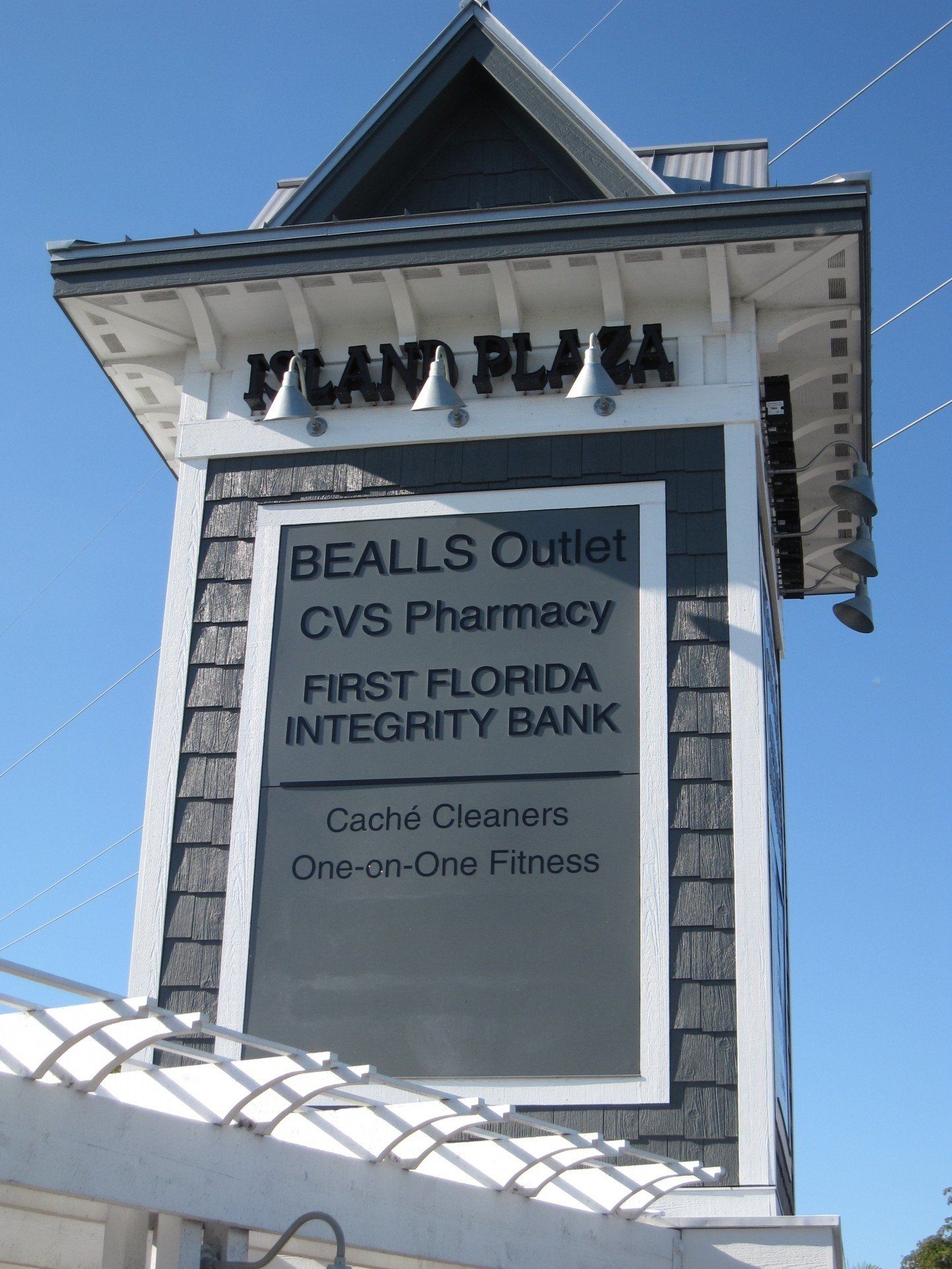 A sign for bealls outlet cvs pharmacy and first florida integrity bank