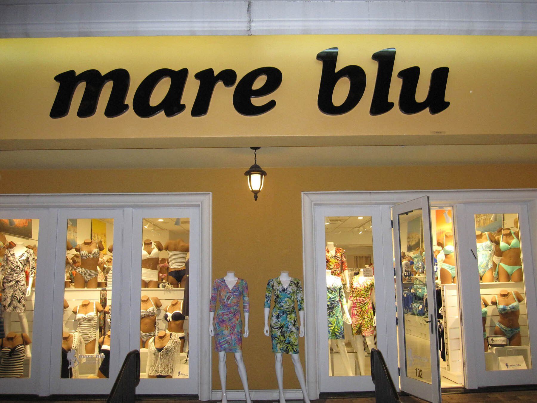 A store called mare blu has mannequins in front of it