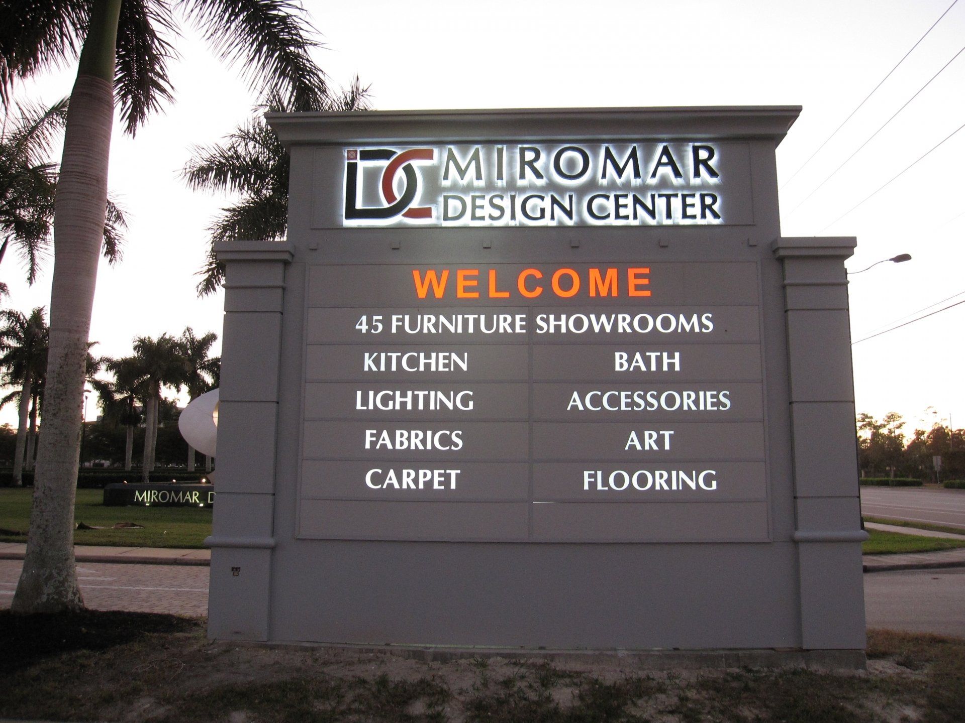 A sign for miromar design center welcomes you to their furniture showrooms