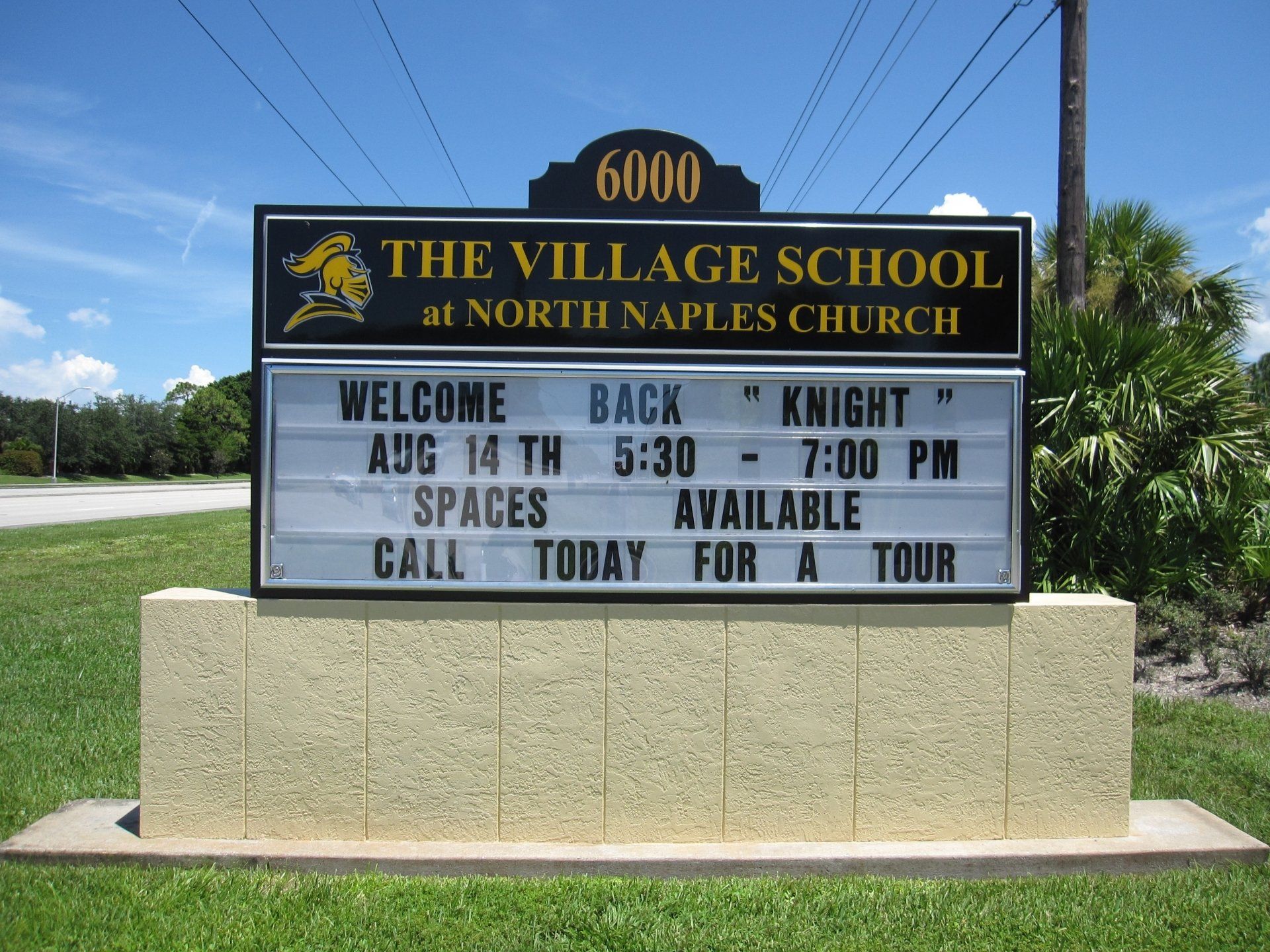 A sign for the village school at north naples church