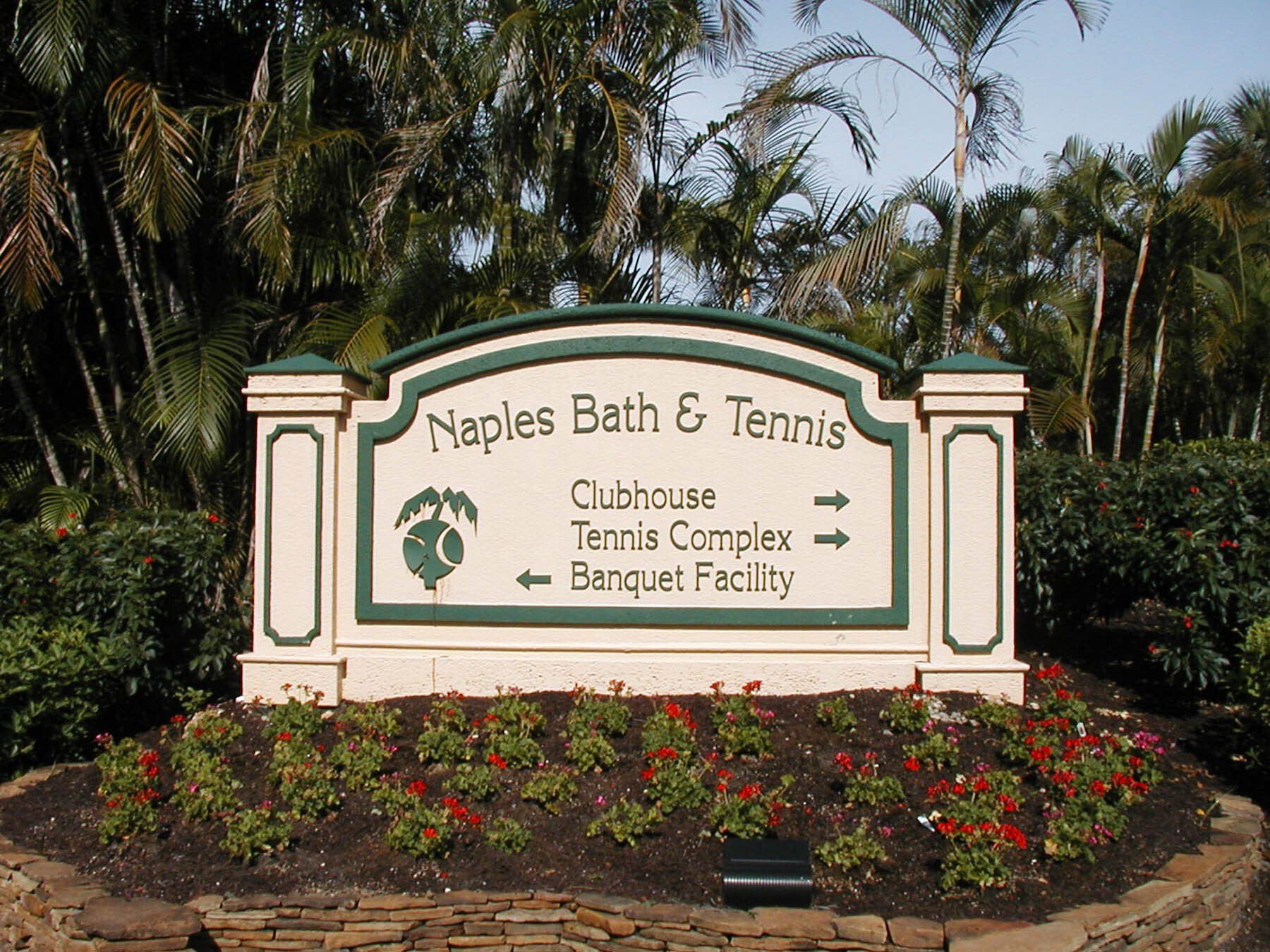 A sign for the naples bath & tennis clubhouse tennis complex and banquet facility
