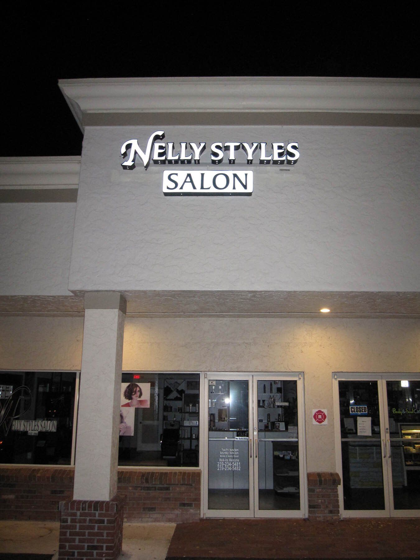 The front of nelly styles salon at night
