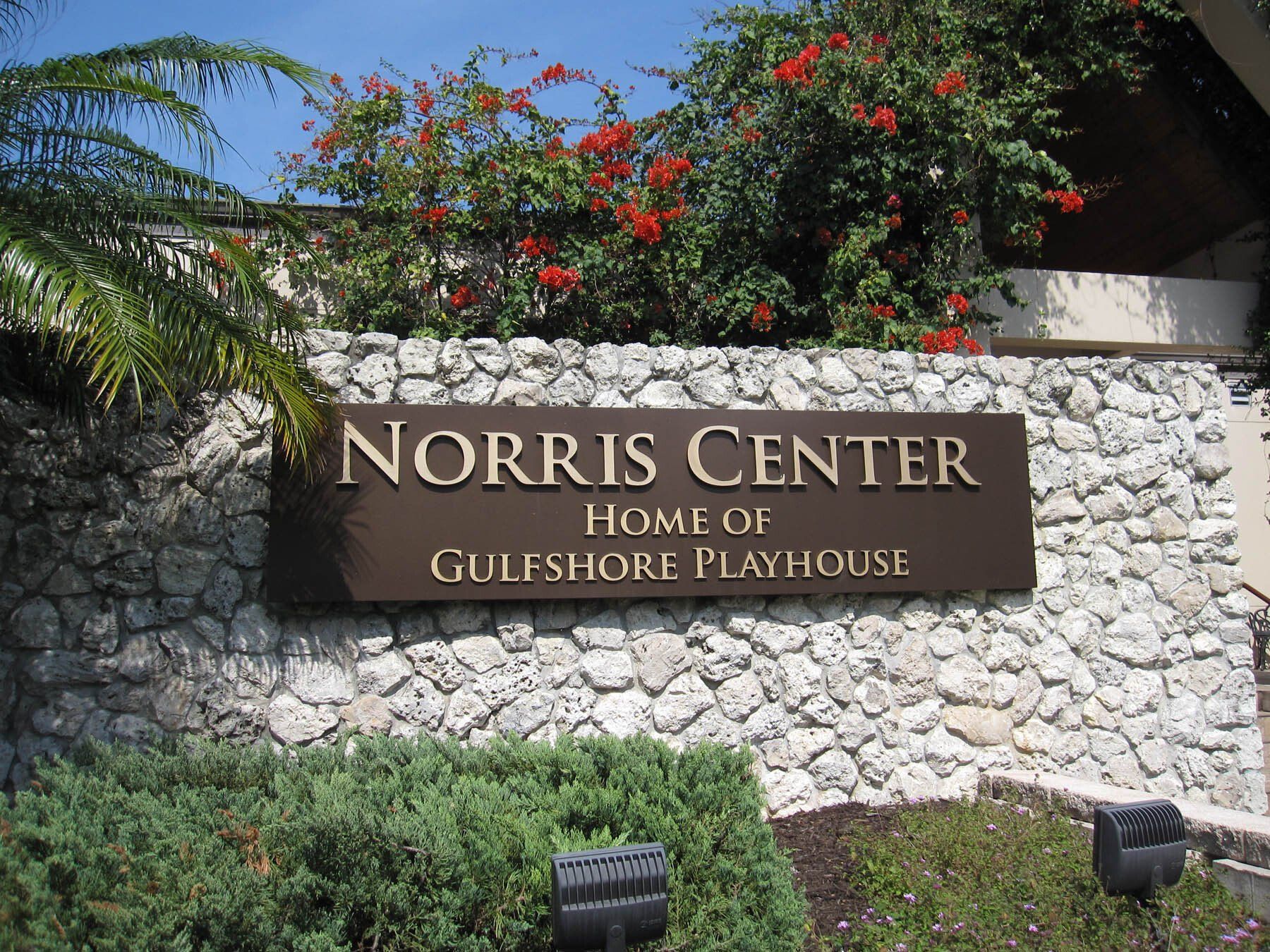 A sign for norris center home of gulfshore playhouse