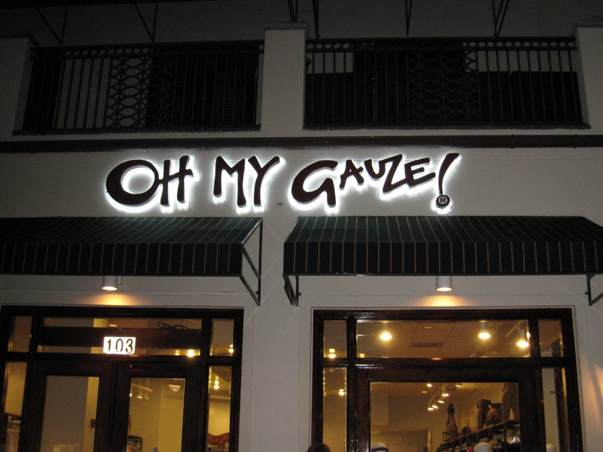 A store front with a sign that says oh my gauze