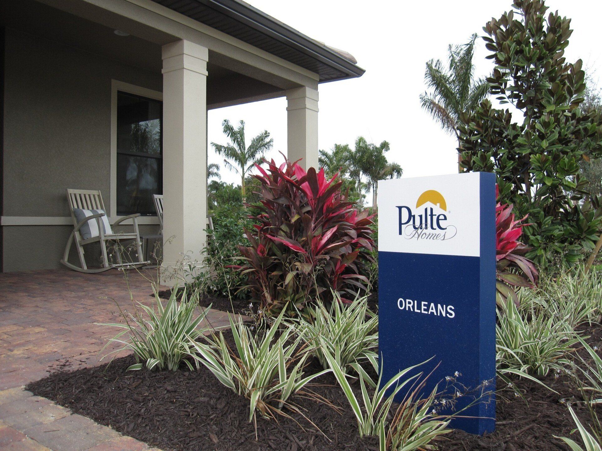 A house with a sign that says pulte on it