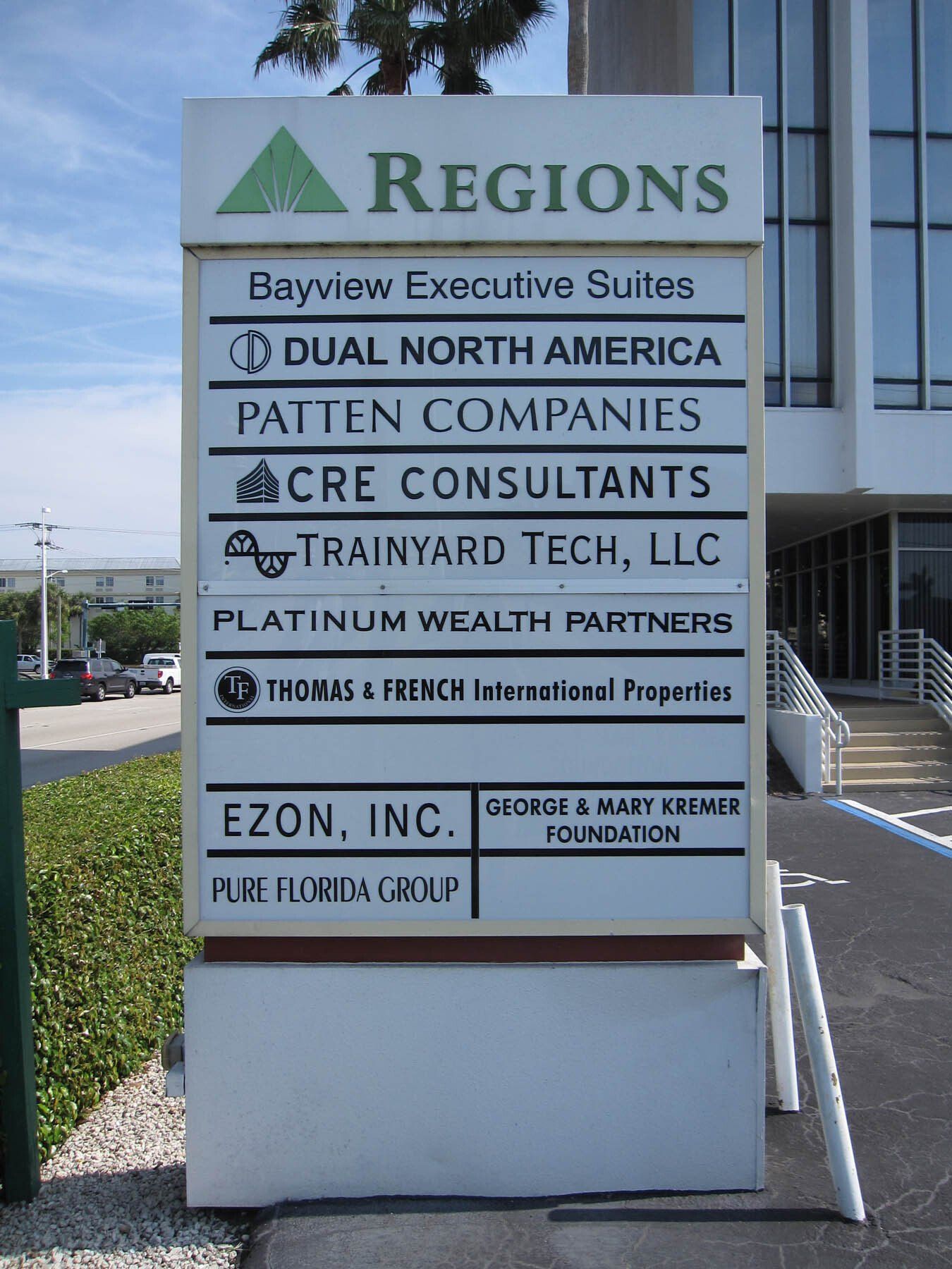 A sign outside of a building that says regions