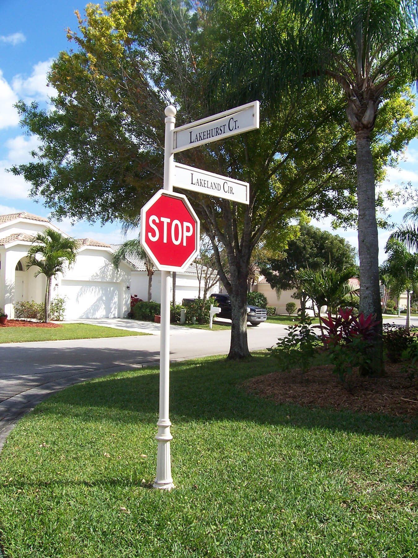 A stop sign is in the middle of a street