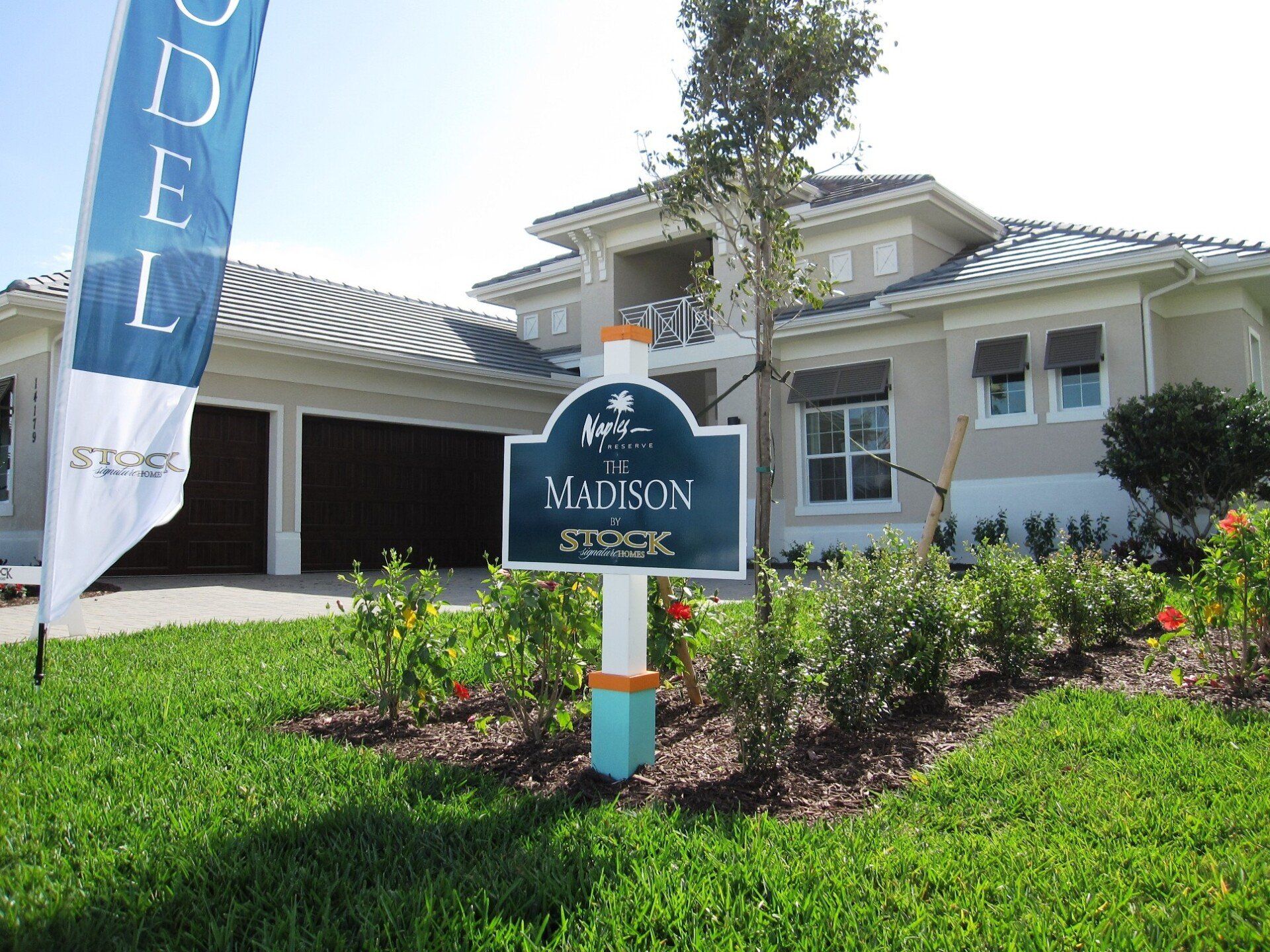 A house with a sign in front of it that says madison
