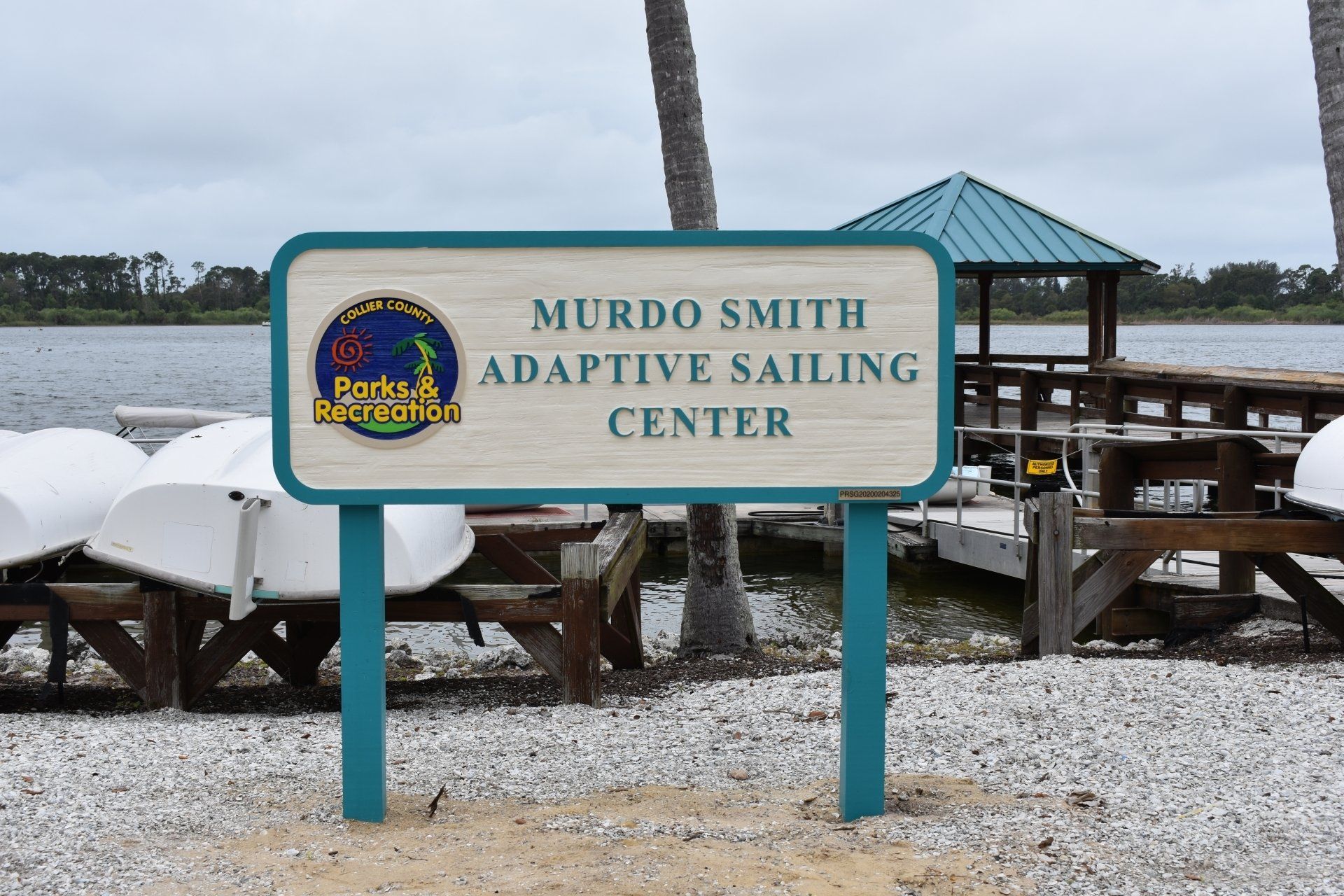 A sign for the murdo smith adaptive sailing center